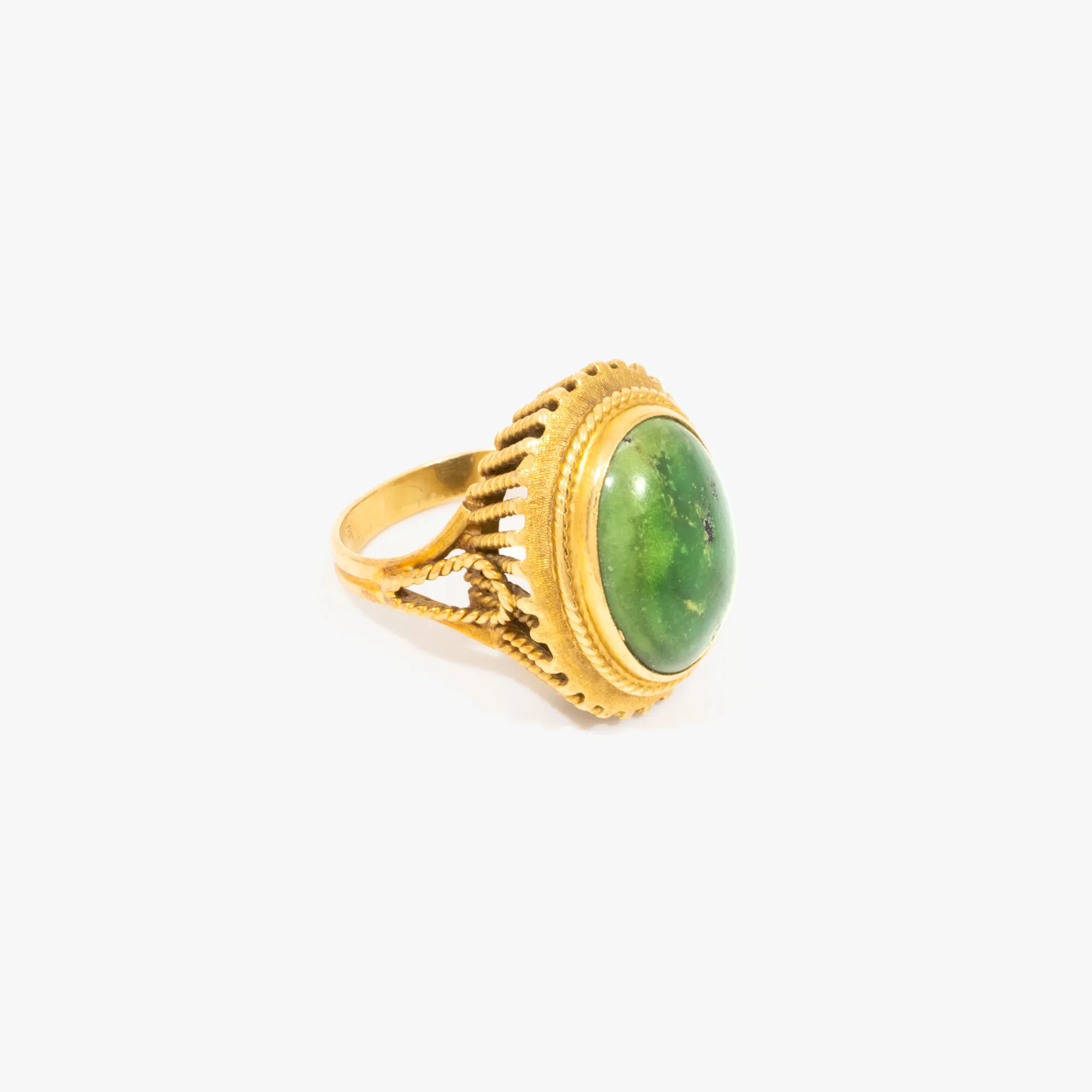Gold ring decorated with green turquoise