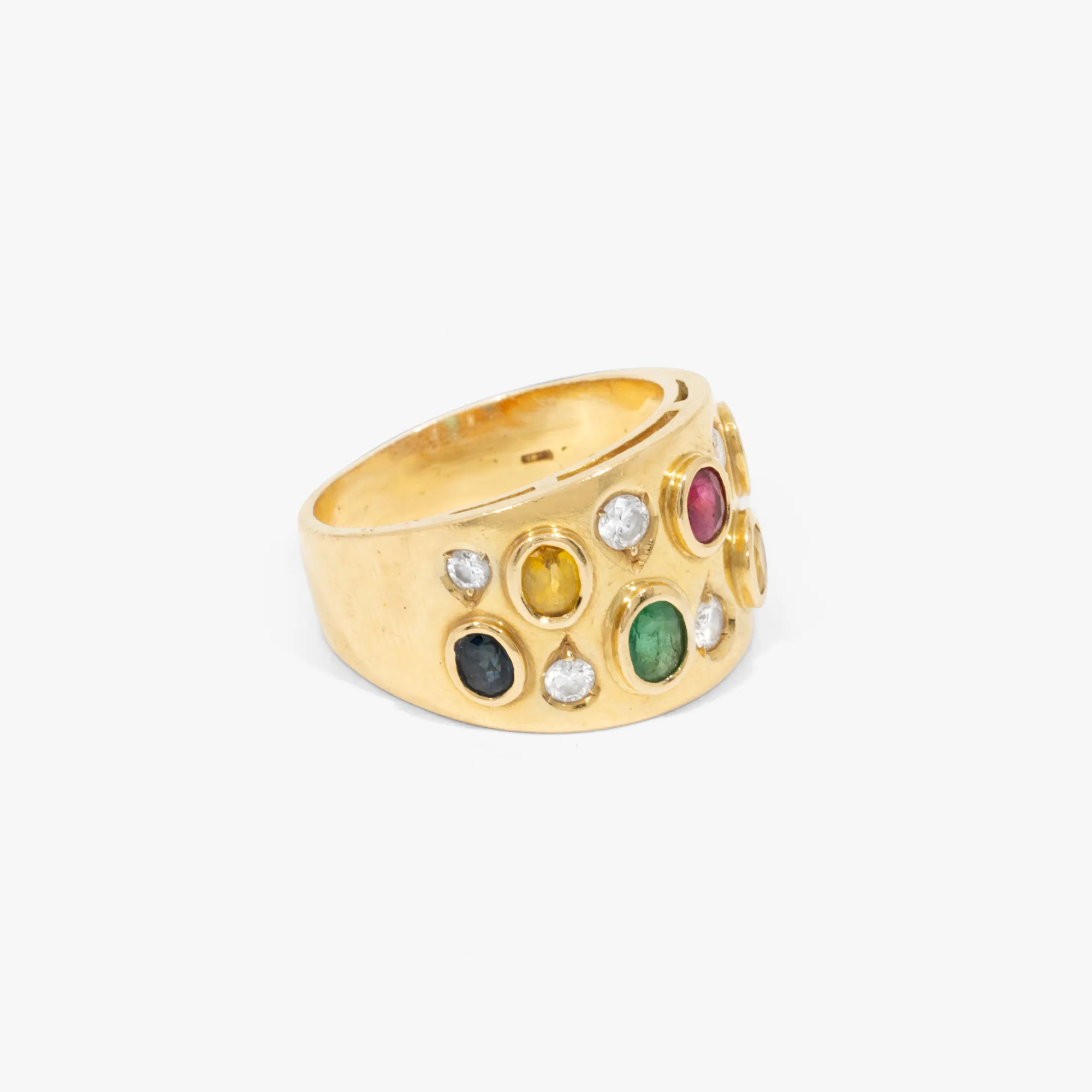 Gold ring, decorated with a mix of precious stones