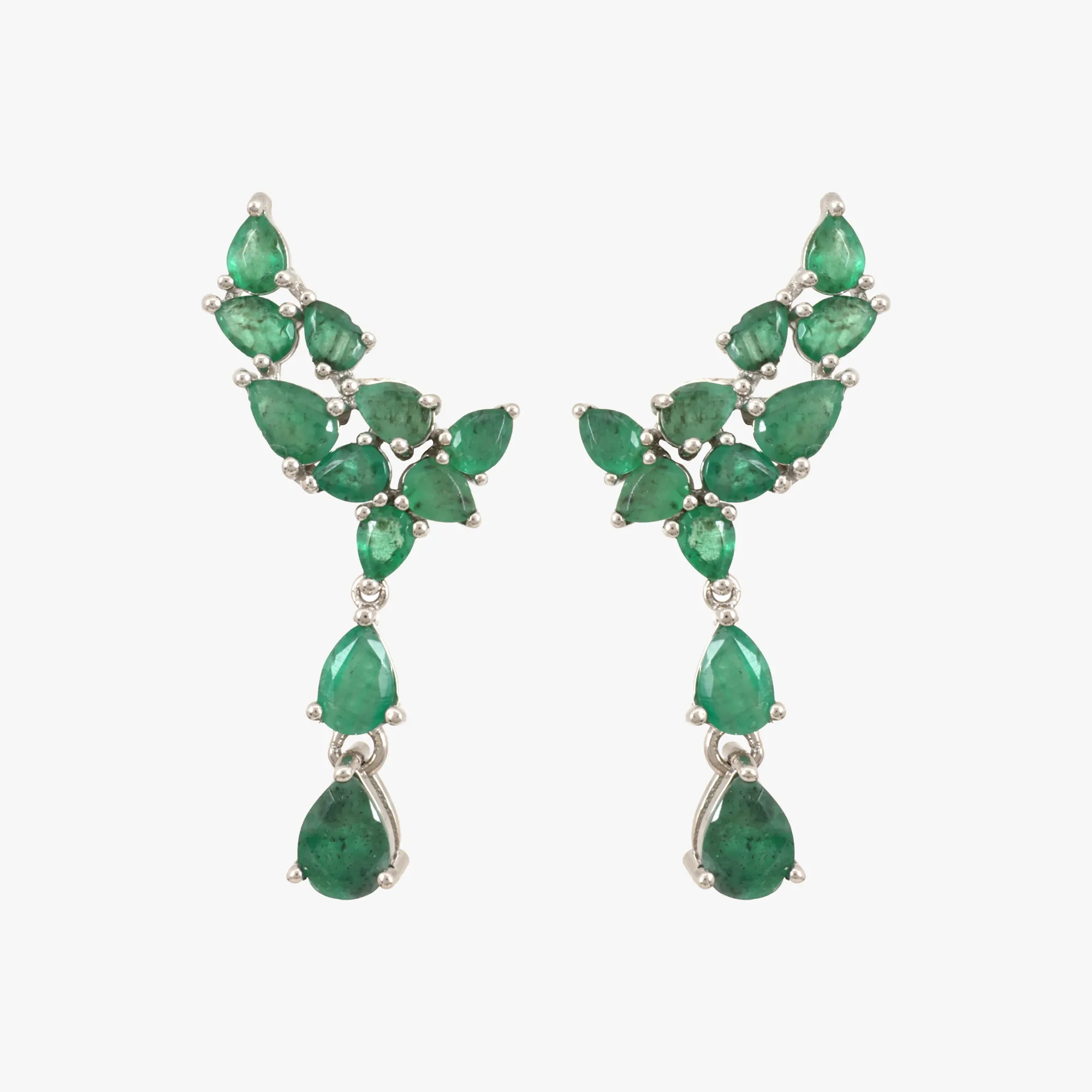 Pair of silver earrings decorated with emeralds