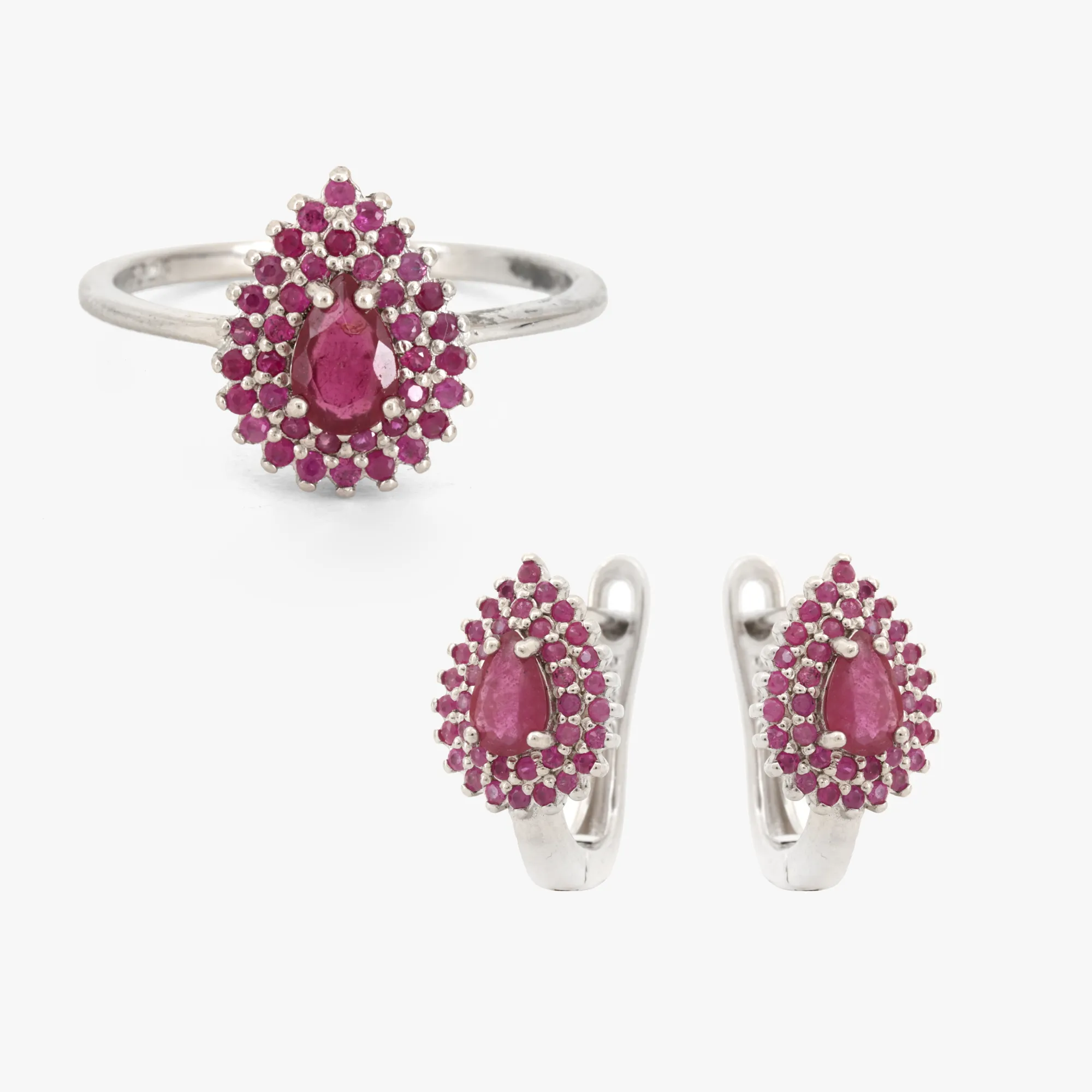 Set consisting of a pair of earrings and a ring, made of silver, decorated with rubies