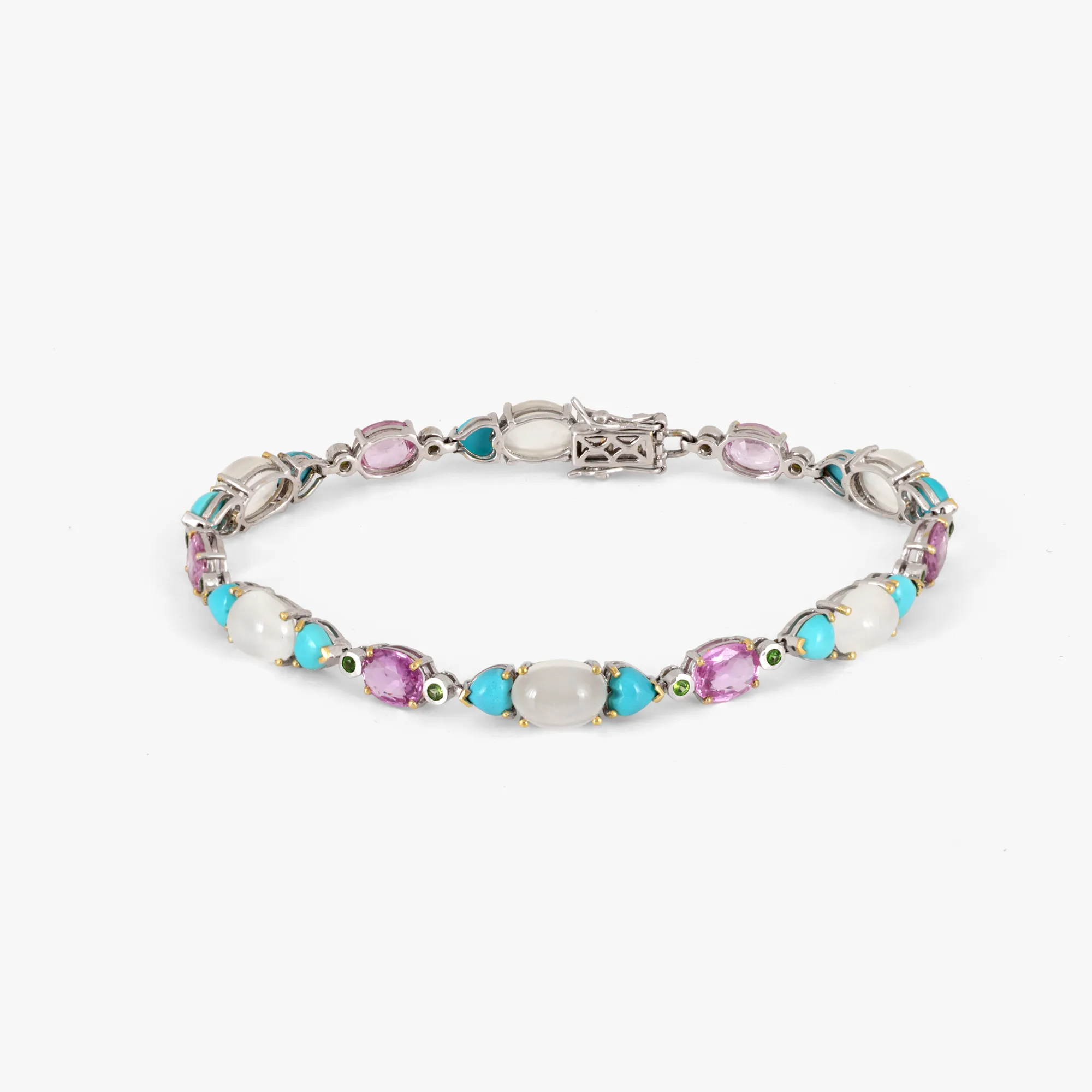 White gold bracelet, decorated with turquoise, opals, peridots, and sapphires