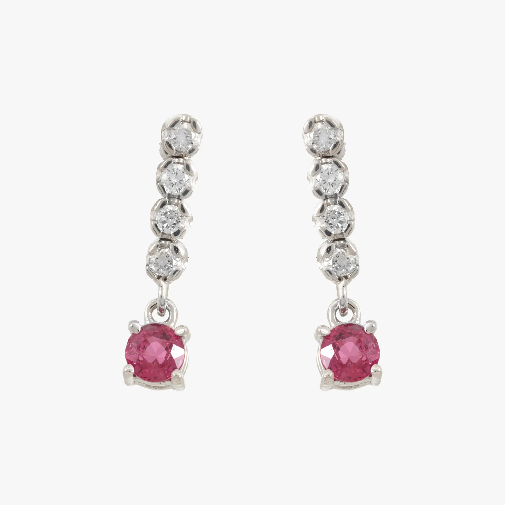 Pair of white gold earrings, decorated with diamonds and rubies