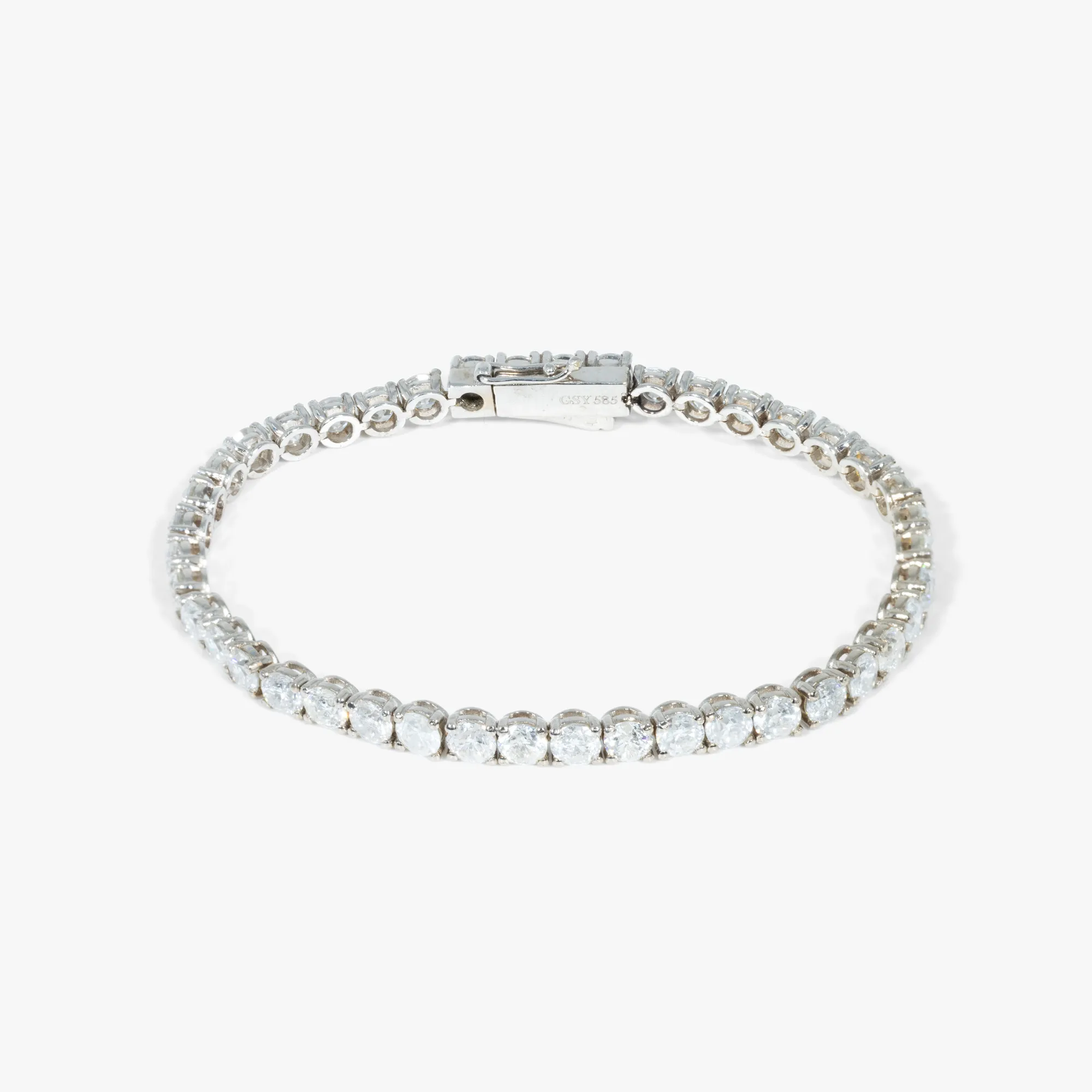 Brățară tennis din aur alb, decorată cu cca. 13 ct. de diamante, însoțită de certificat gemologic GW LAB