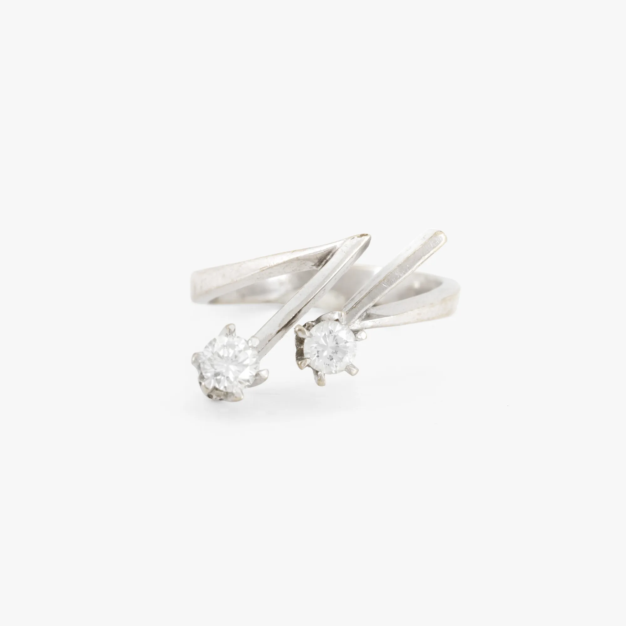 White gold ring decorated with two diamonds