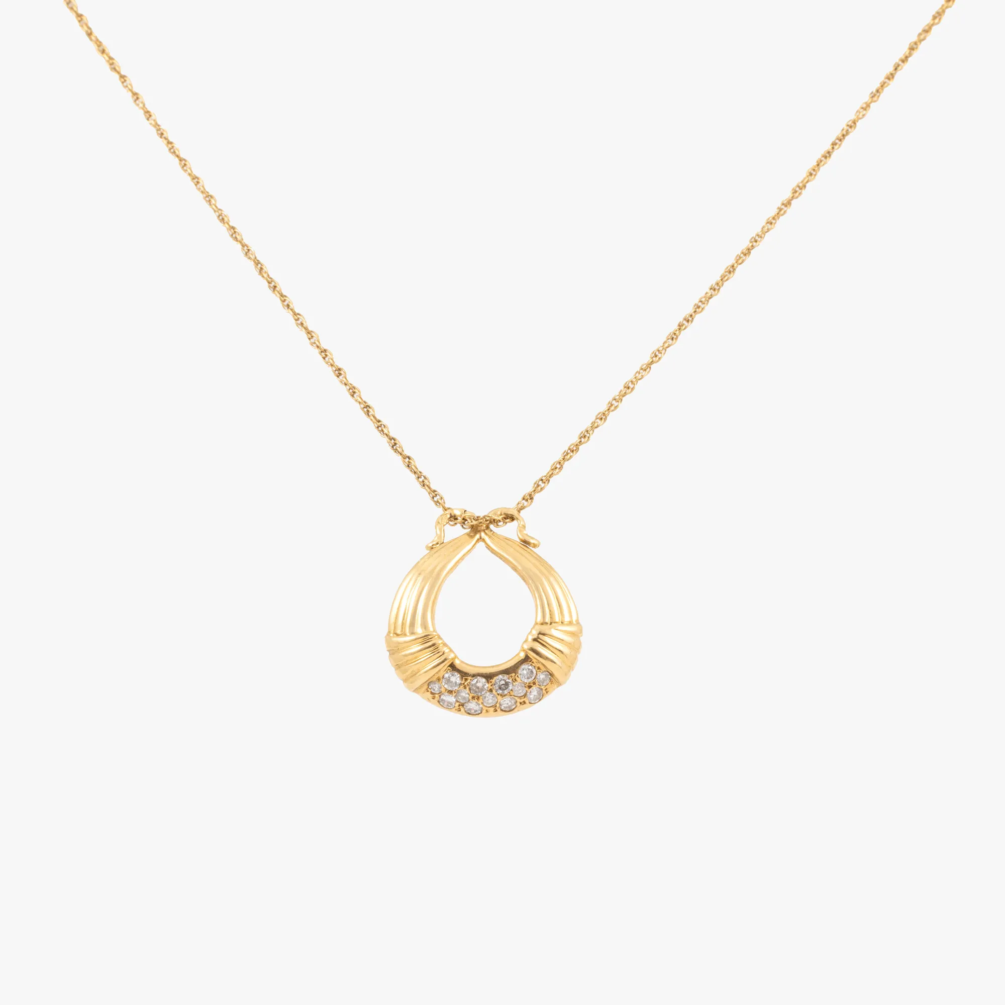 Gold chain with diamond-decorated pendant