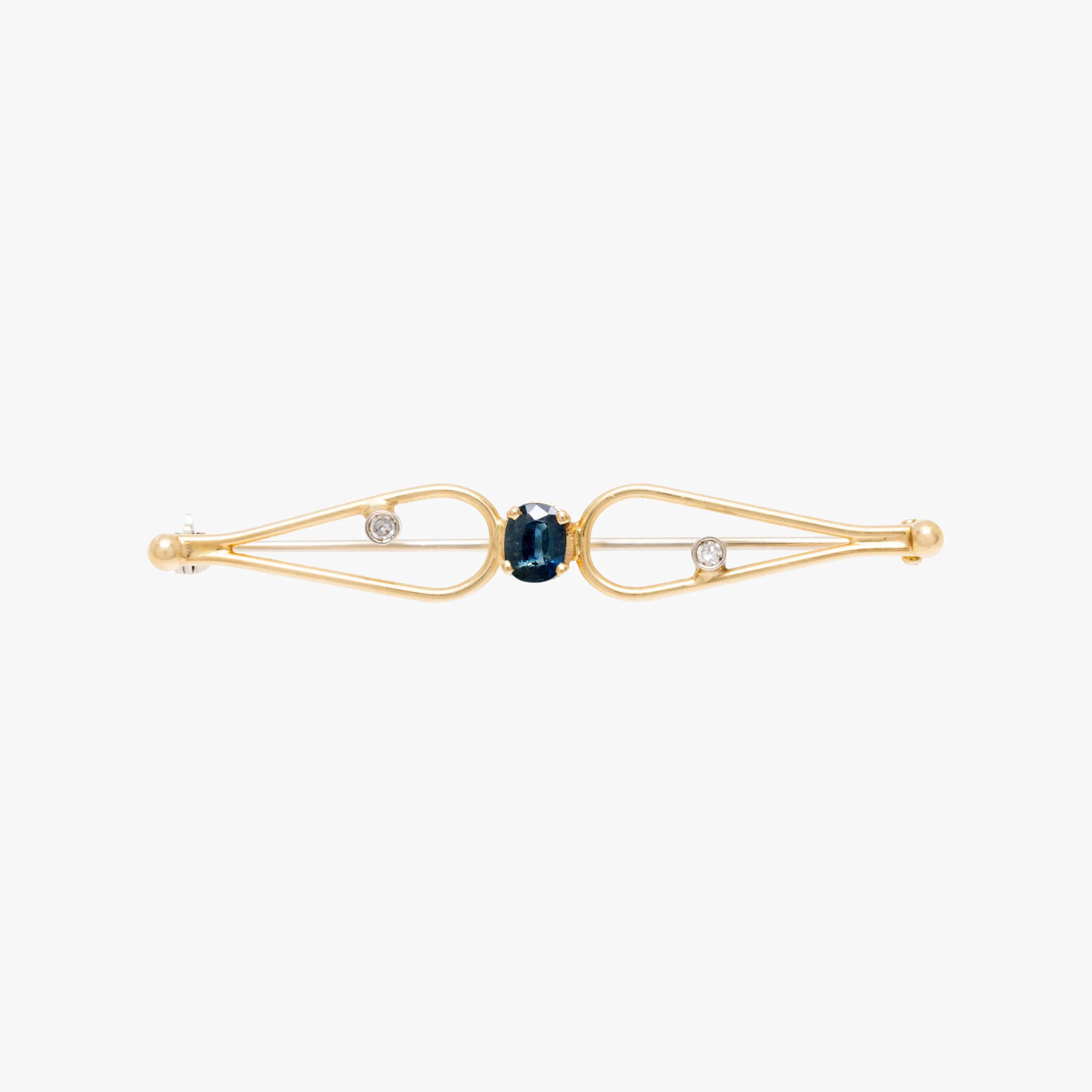 Bicolor gold brooch, decorated with sapphire and diamonds
