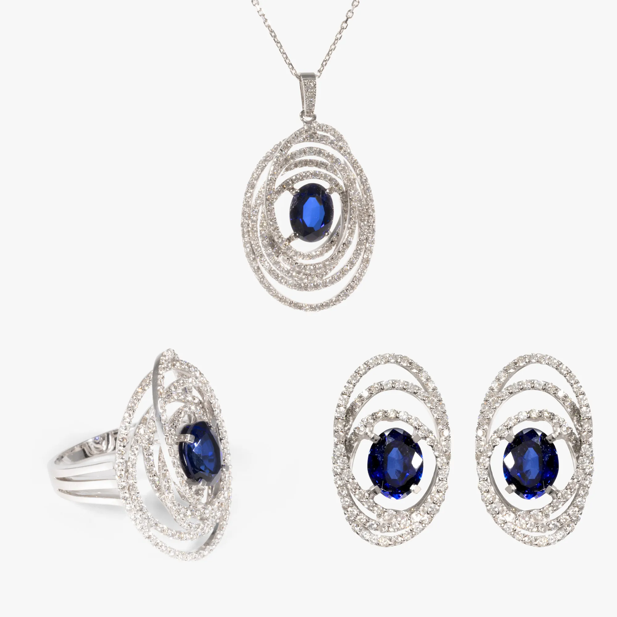White gold set, composed of a necklace with pendant, earrings and ring, decorated with diamonds