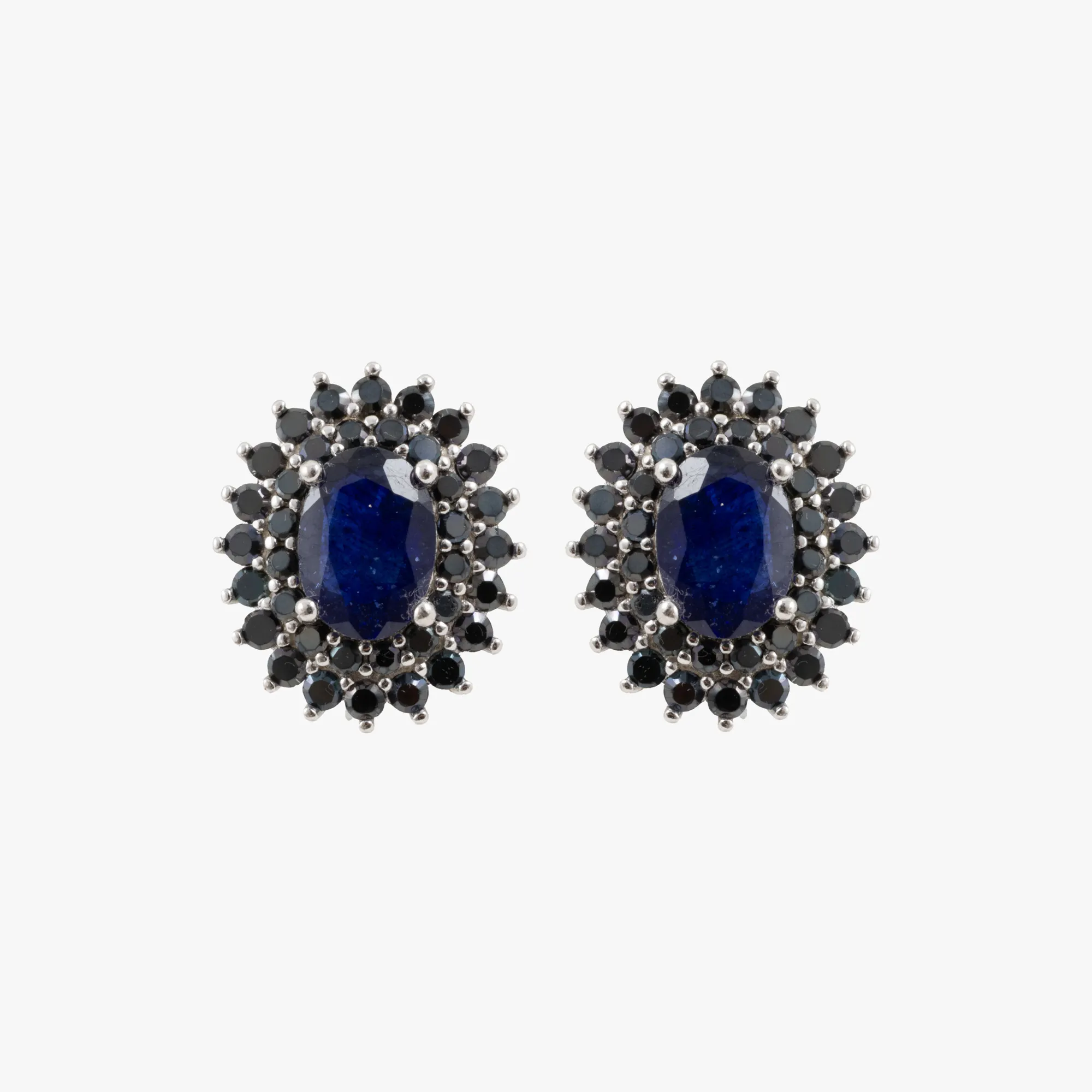 Pair of gold-plated silver earrings decorated with sapphires and spines
