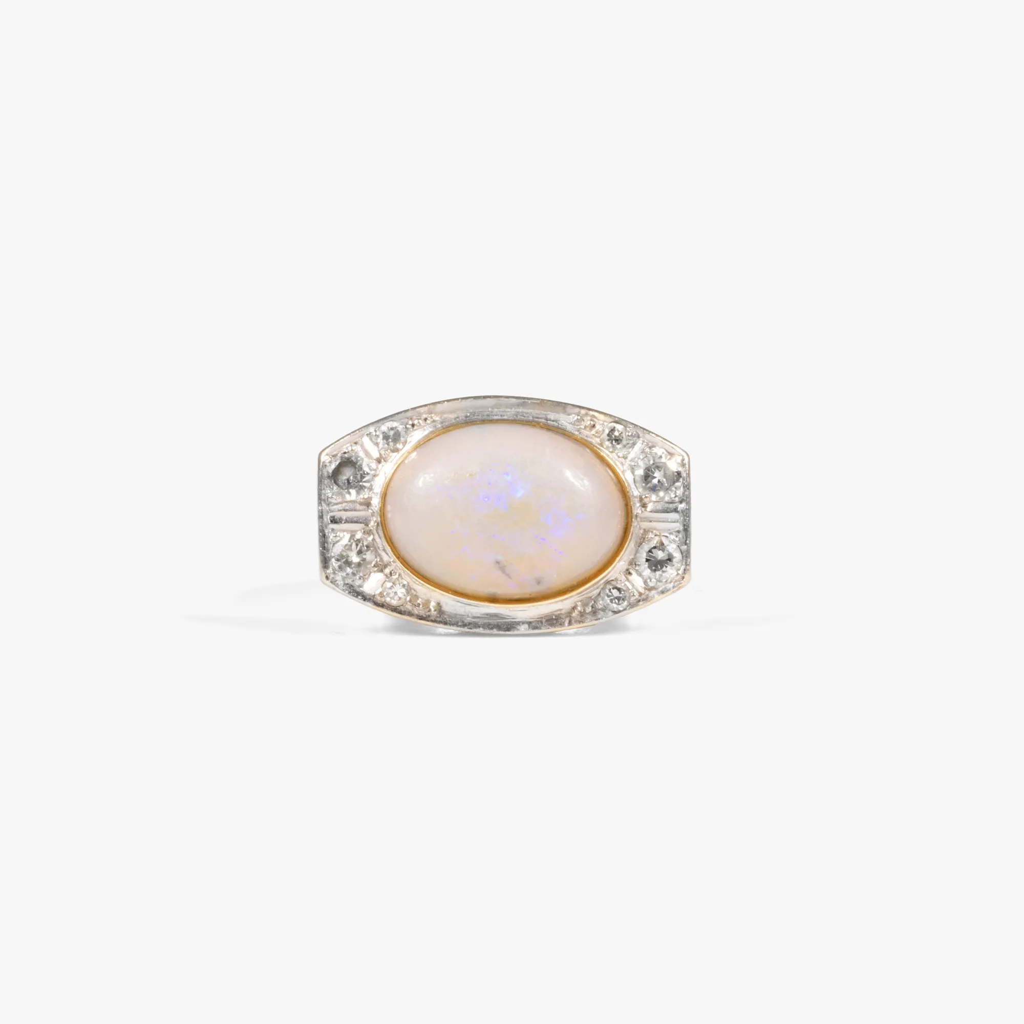 Gold ring decorated with opal and diamonds
