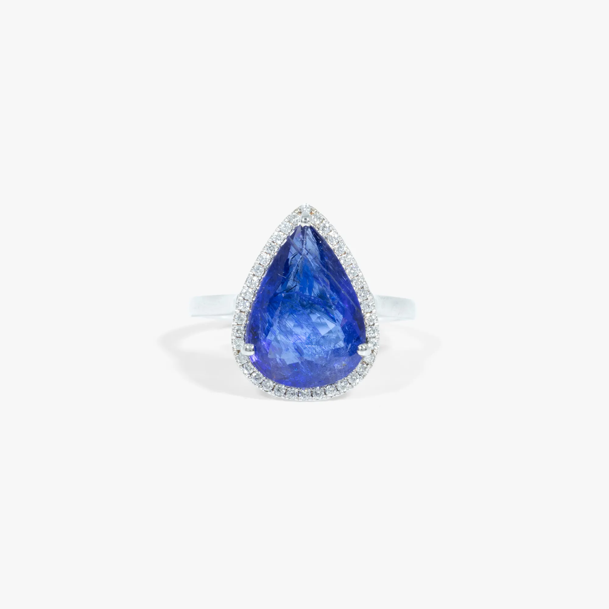 White gold ring decorated with tanzanite and diamonds, accompanied by an additional gemological certificate