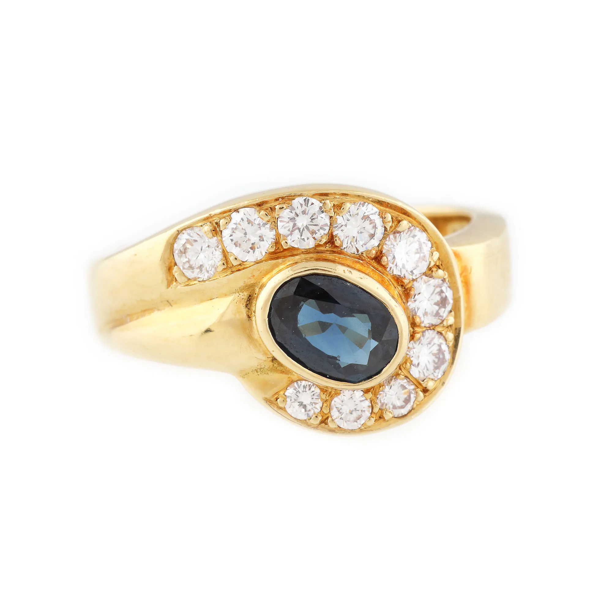 Gold ring decorated with sapphire and diamonds