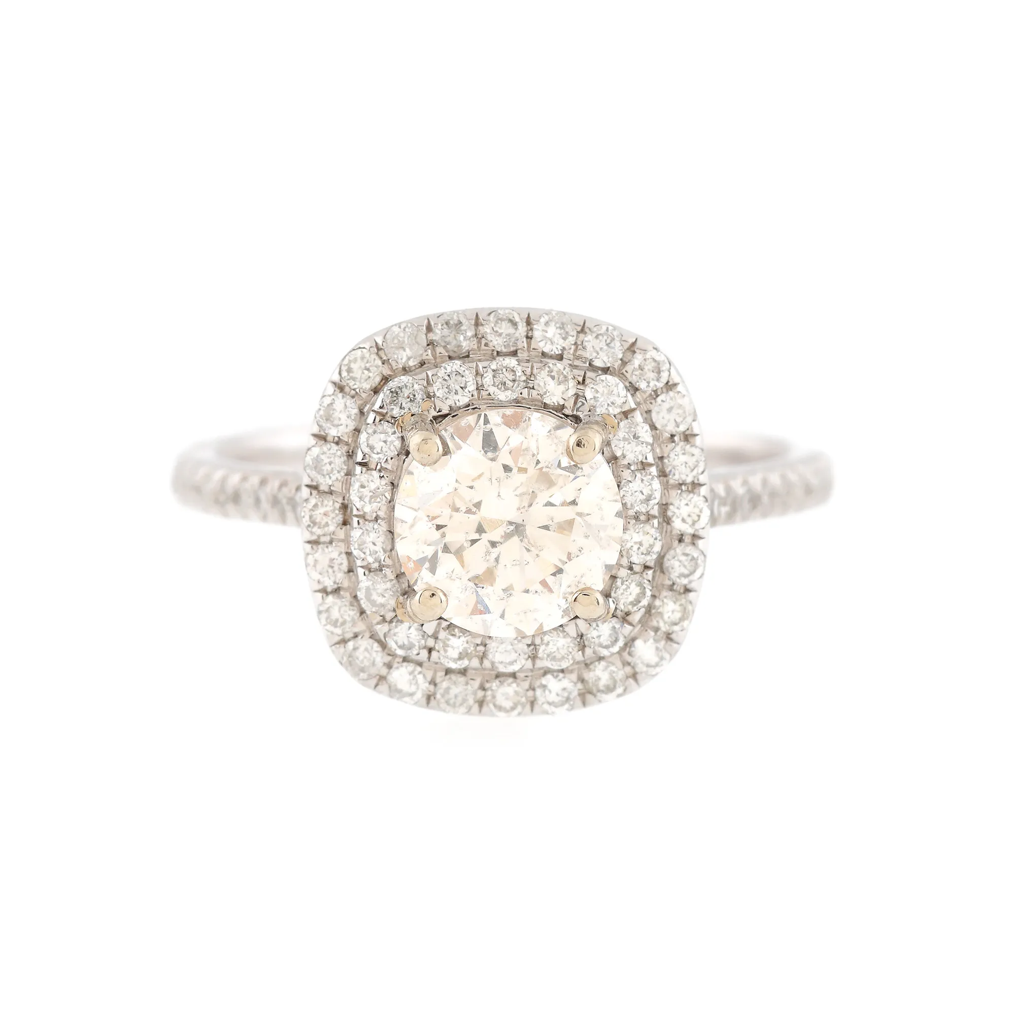 White gold ring, centrally decorated with light brownish pink brilliant cut diamond, surrounded by two rows of diamonds, part of the collection of an architect