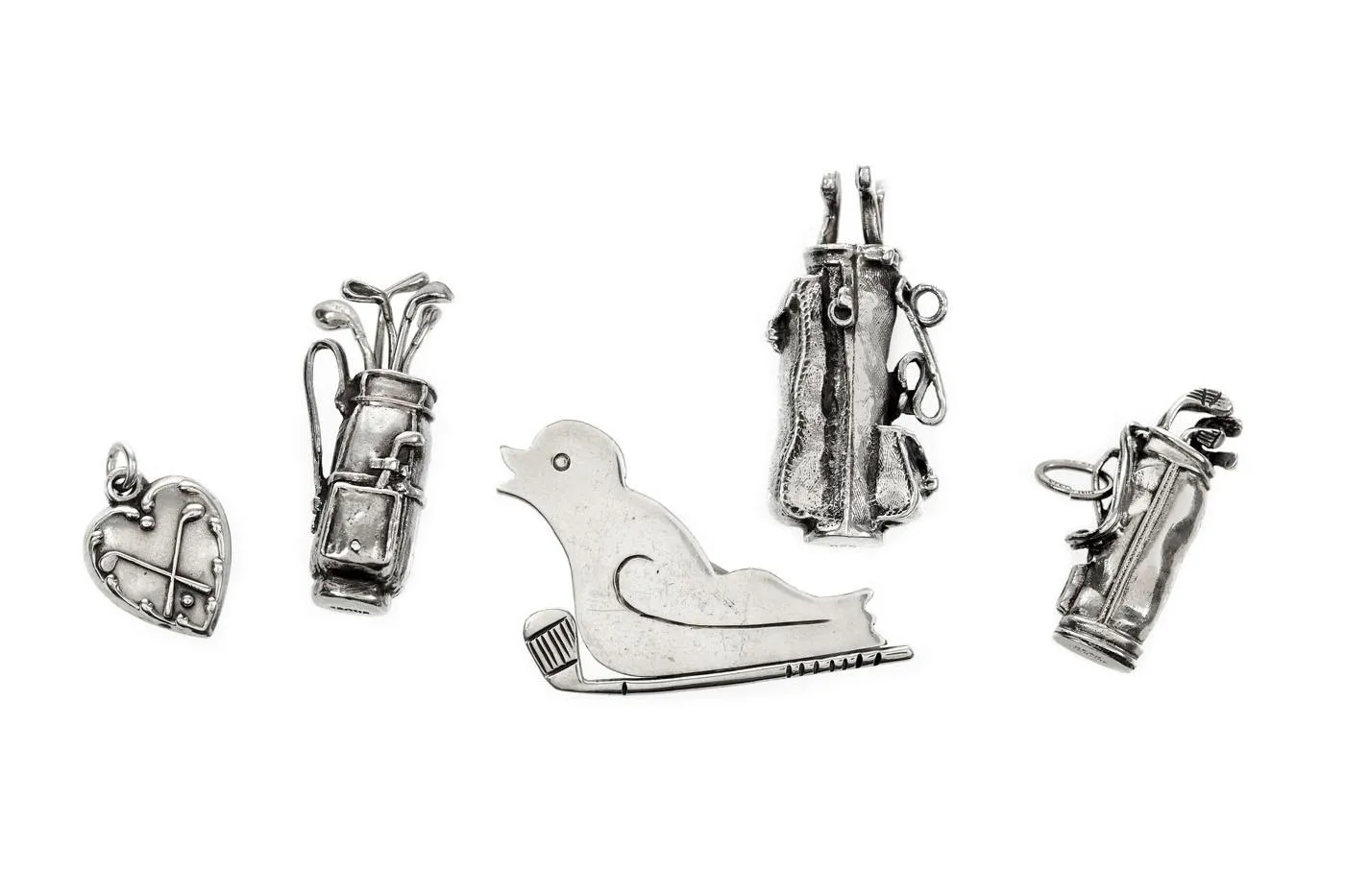 Silver set, consisting of five miniature pieces related to golf.