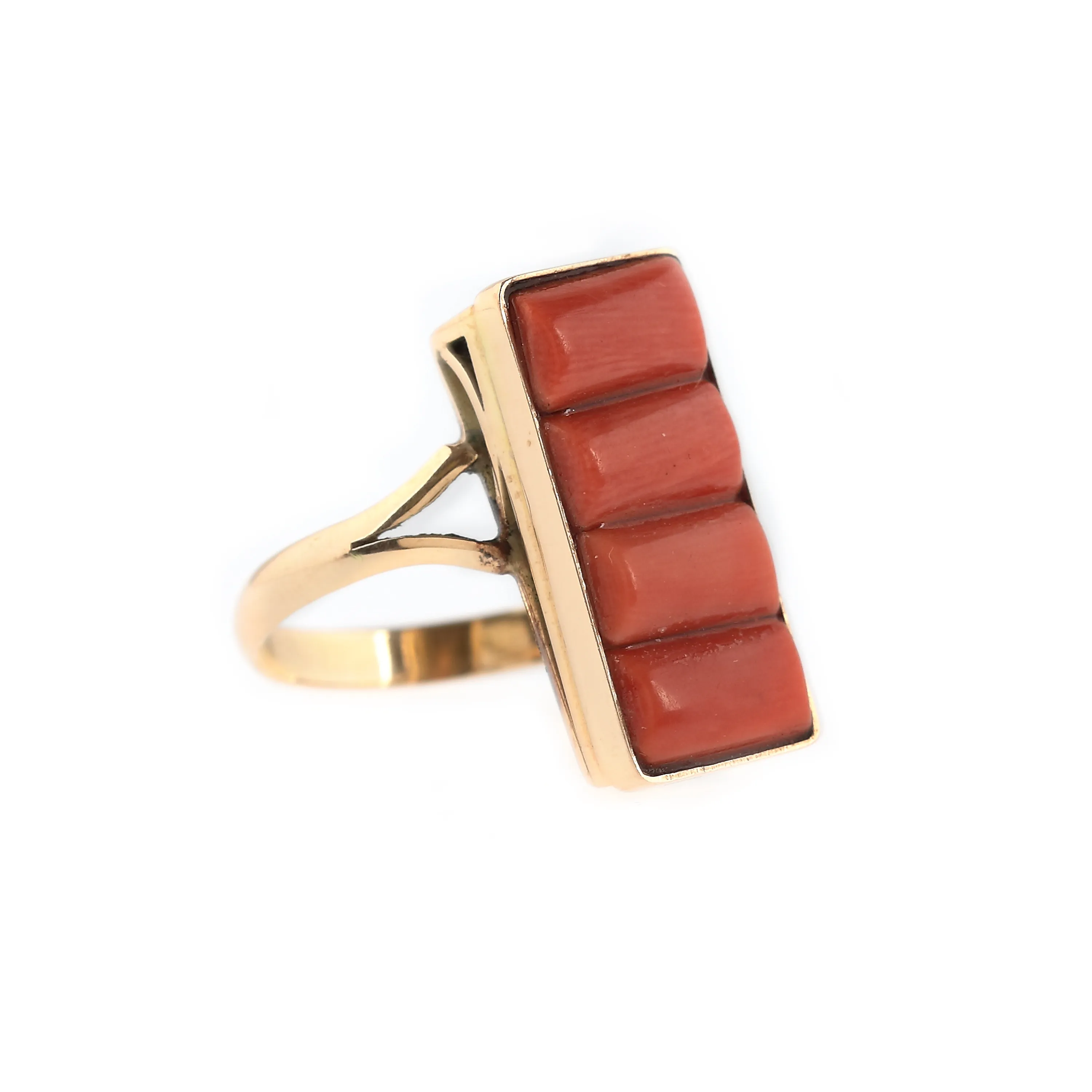 Gold ring decorated with red coral