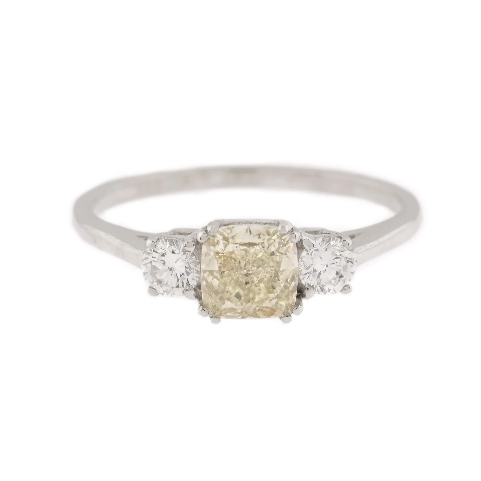 Ring, white gold, decorated with central diamond, surrounded by two brilliants