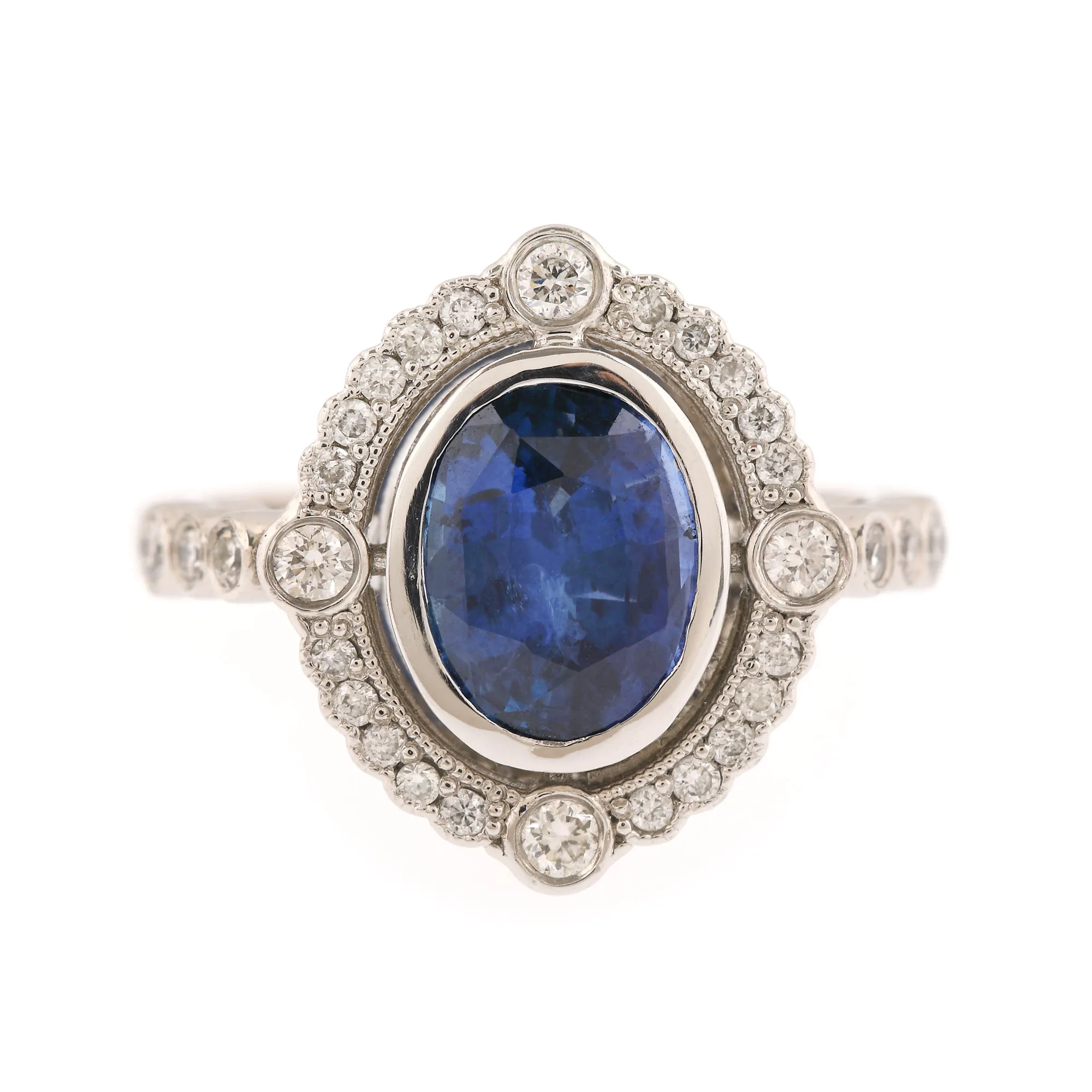 Ring, platinum, decorated with central sapphire and brilliants