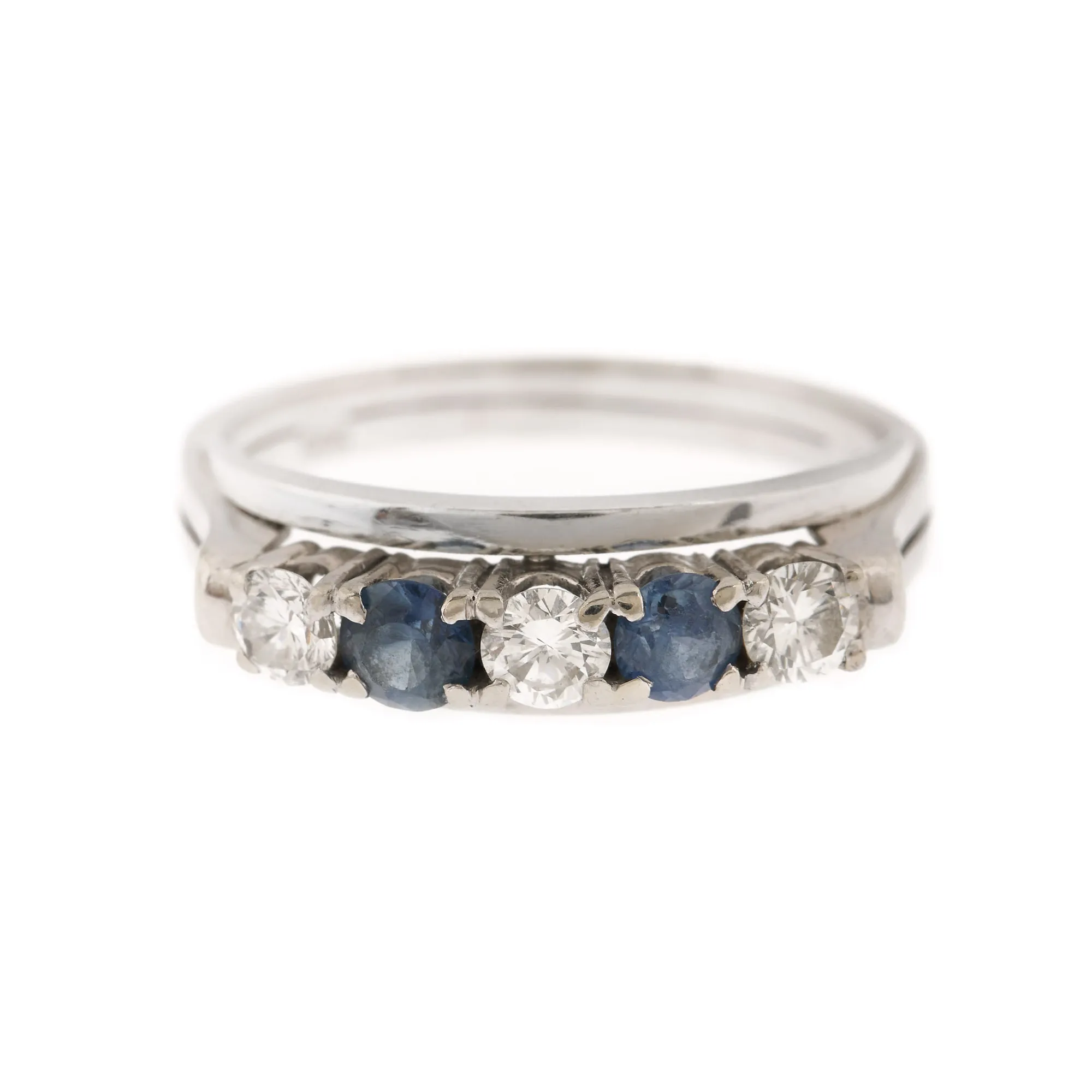 Ring, white gold, decorated with sapphires and diamonds