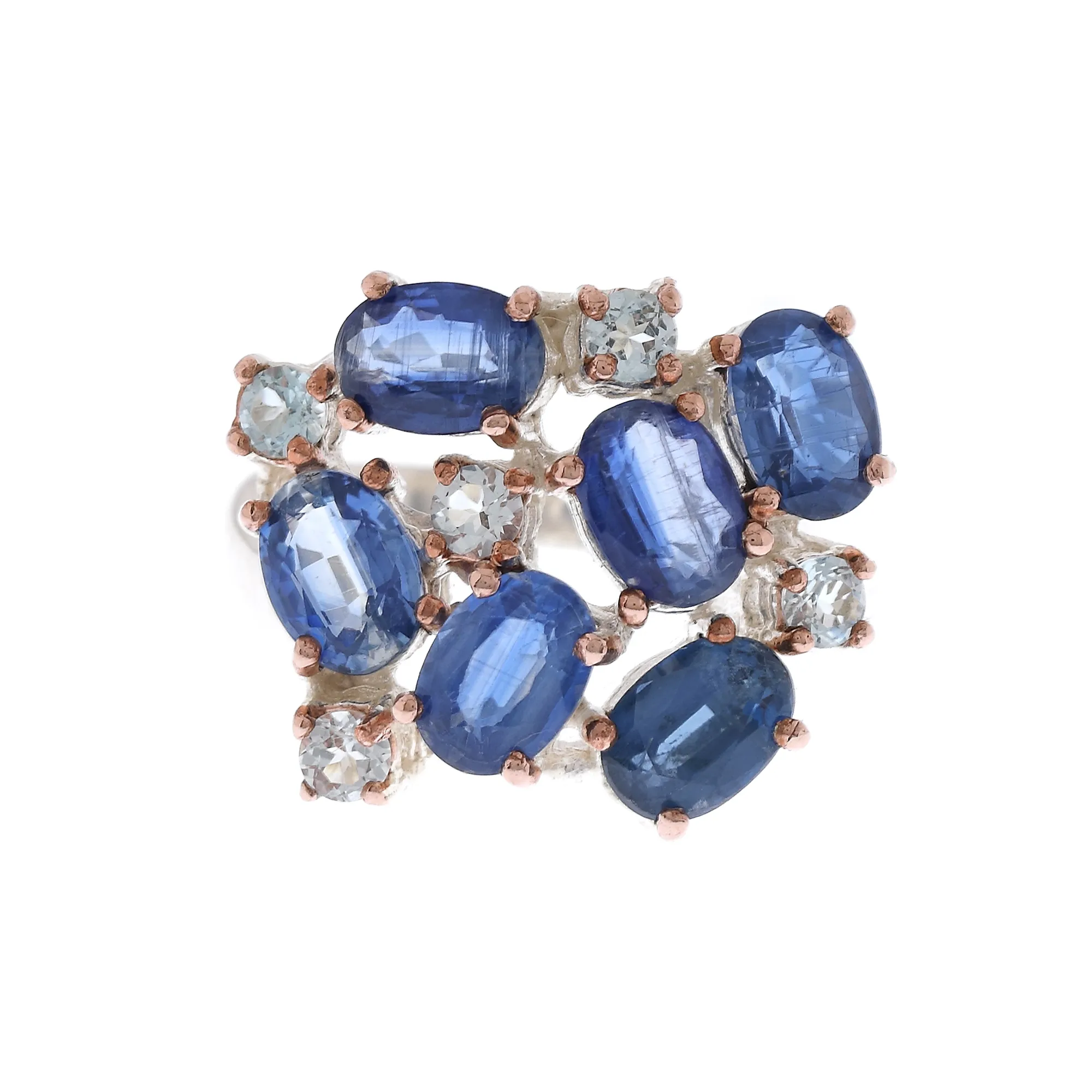 Silver ring decorated with kyanite and topazes