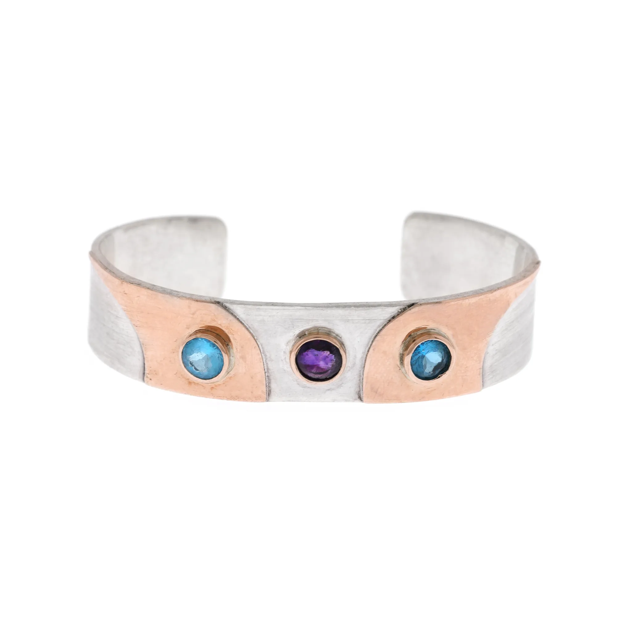 Silver bracelet with gold plaques, decorated with two topazes and an amethyst