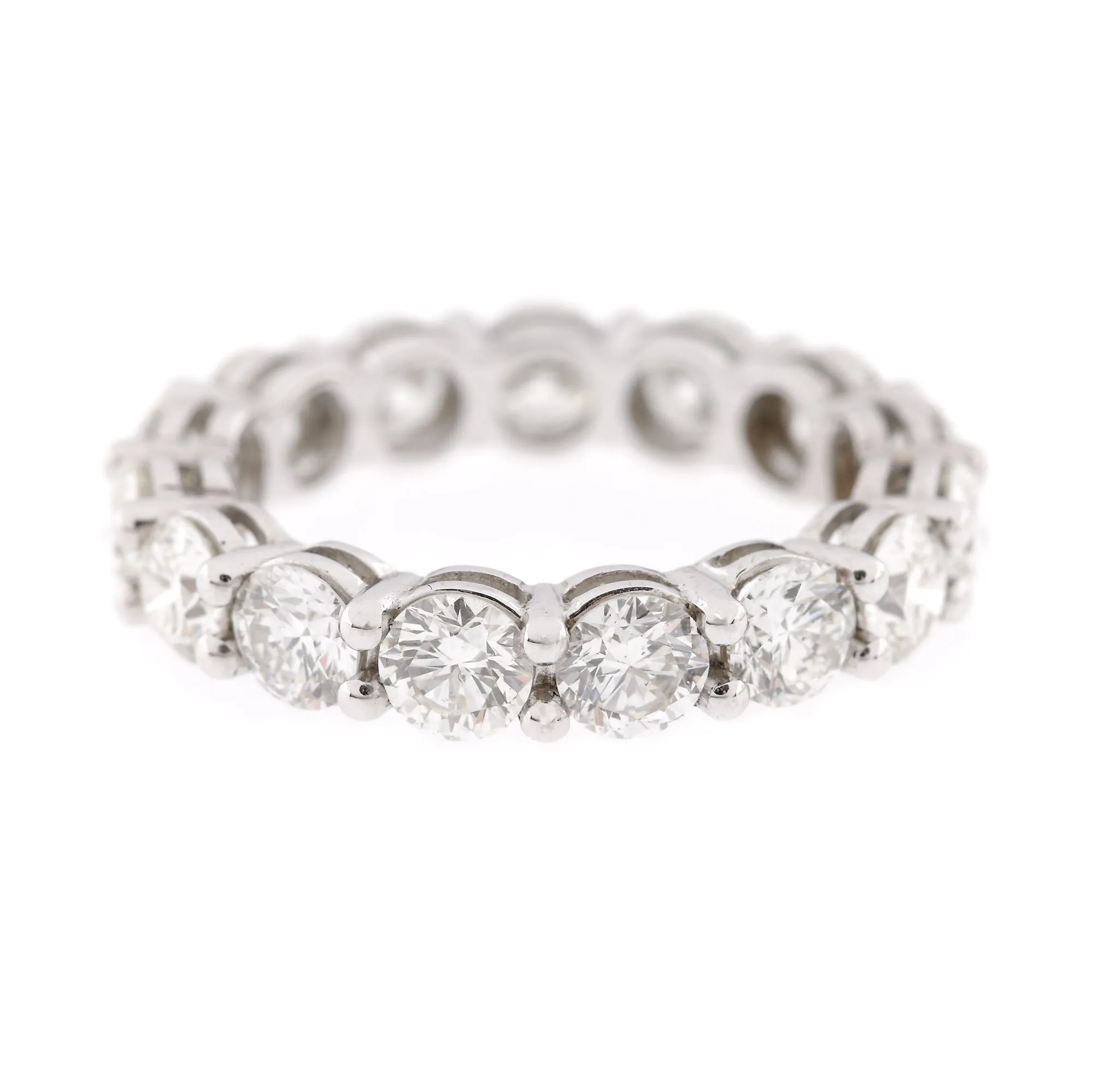 "Infinity" - white gold ring, decorated with string of diamonds