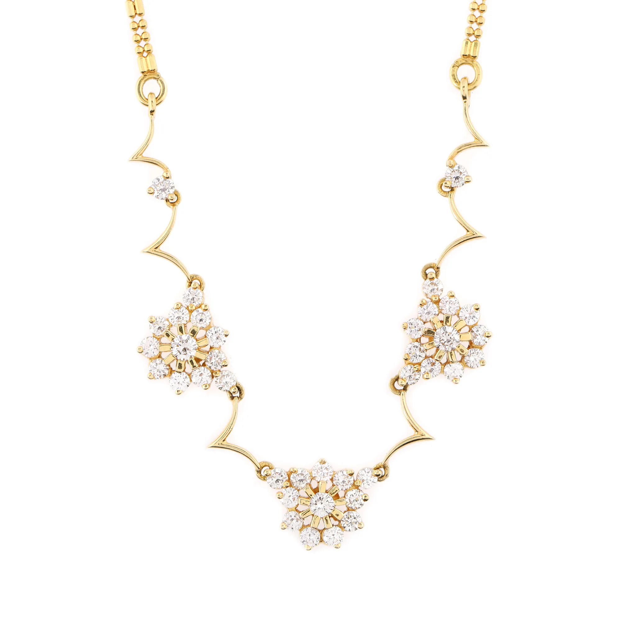 Gold necklace, decorated with diamonds arranged in floral patterns