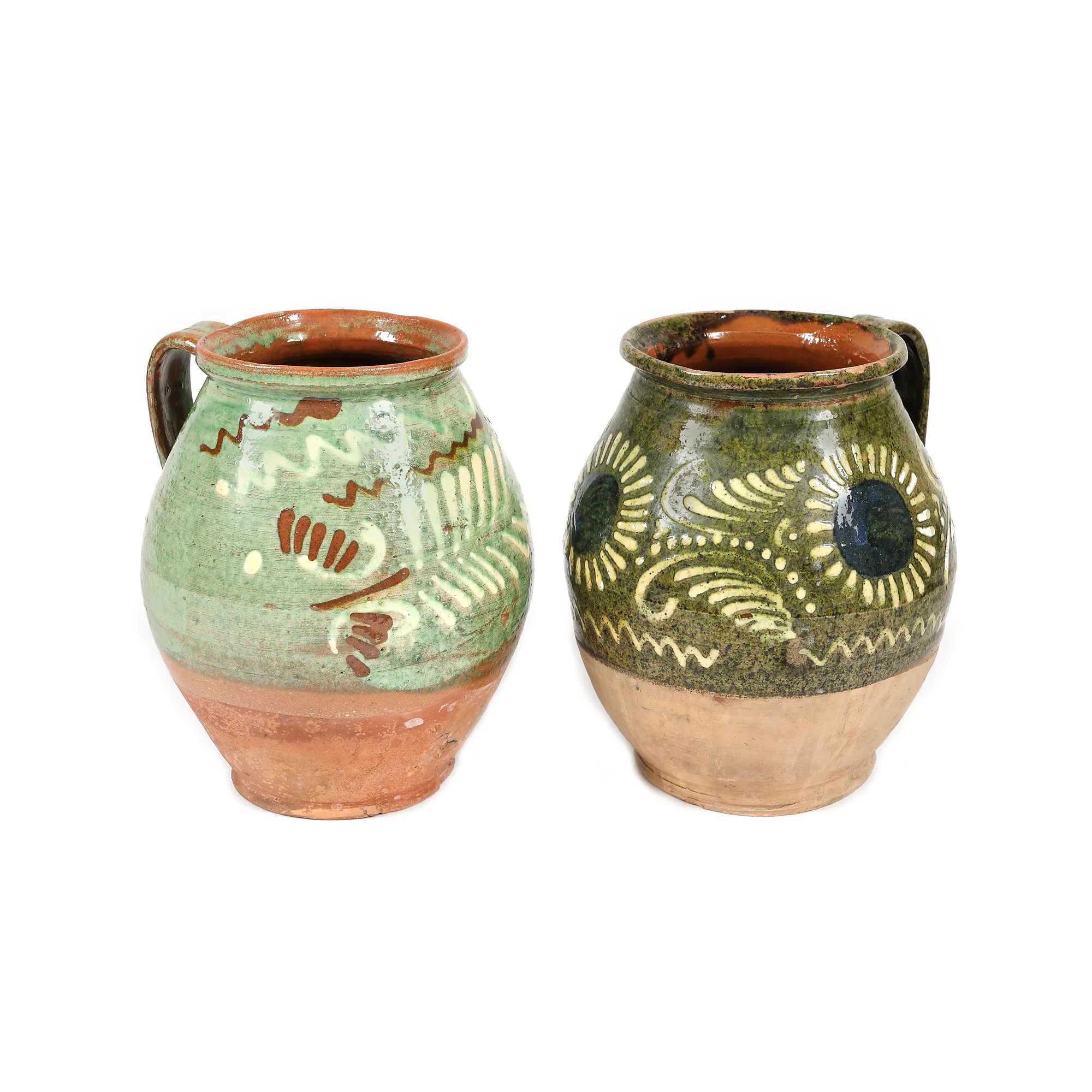 Lot consisting of two milk jugs, decorated with floral-vegetal motifs, Horezu centre, mid-20th century, originates from the collection of the family of Spiru and Simona Chintilă