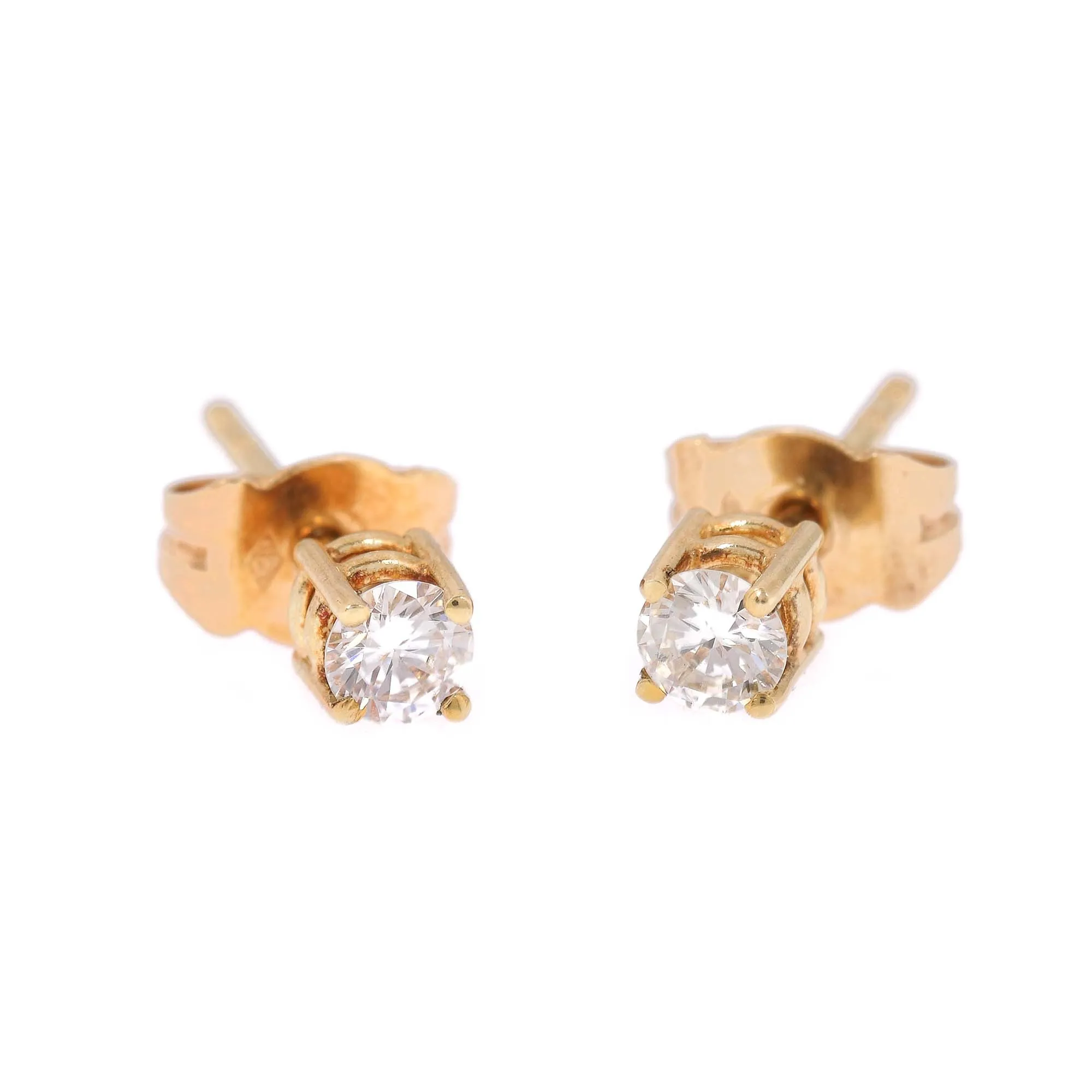 Pair of gold earrings decorated with round brilliant diamonds