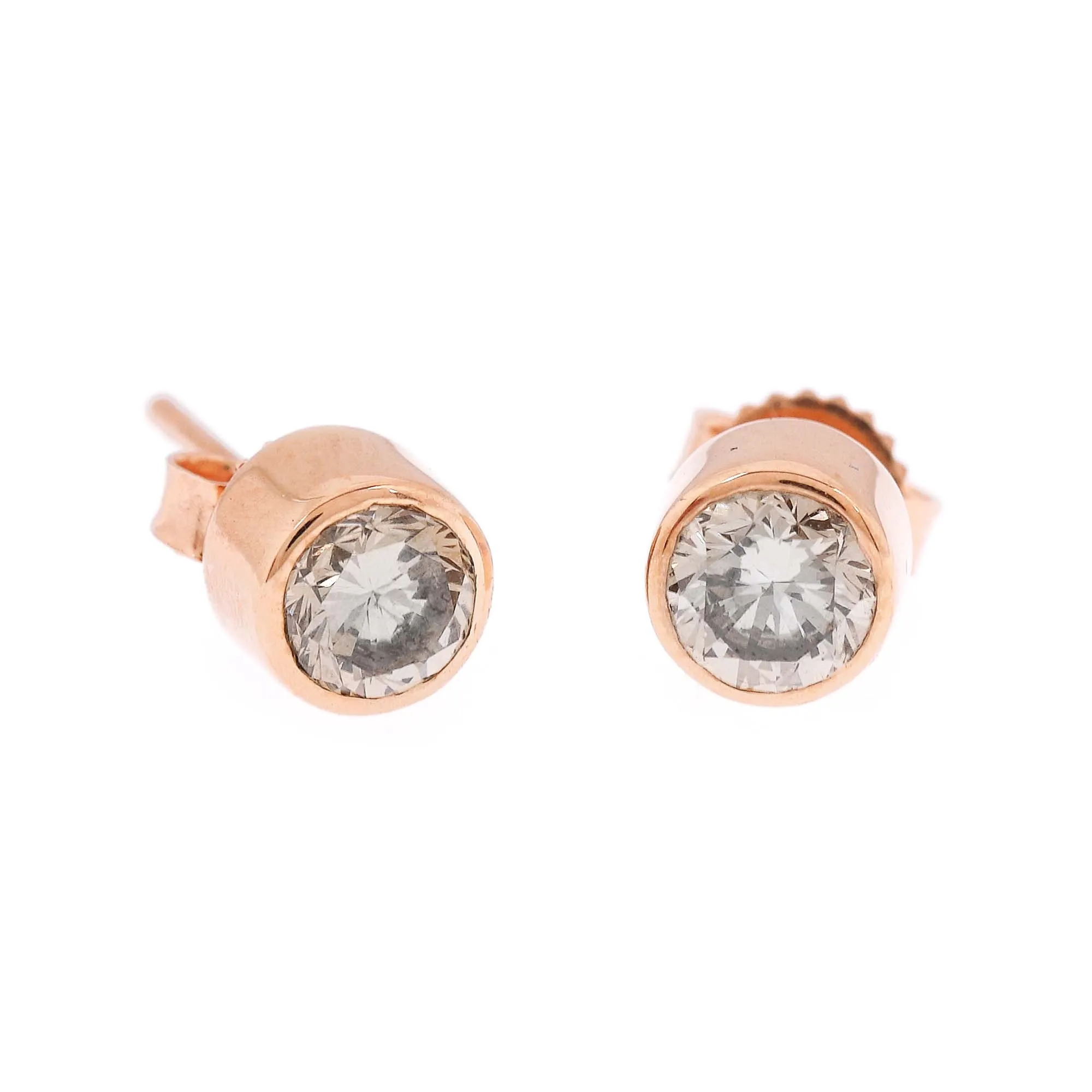 Pair of rose gold earrings decorated with brown diamonds