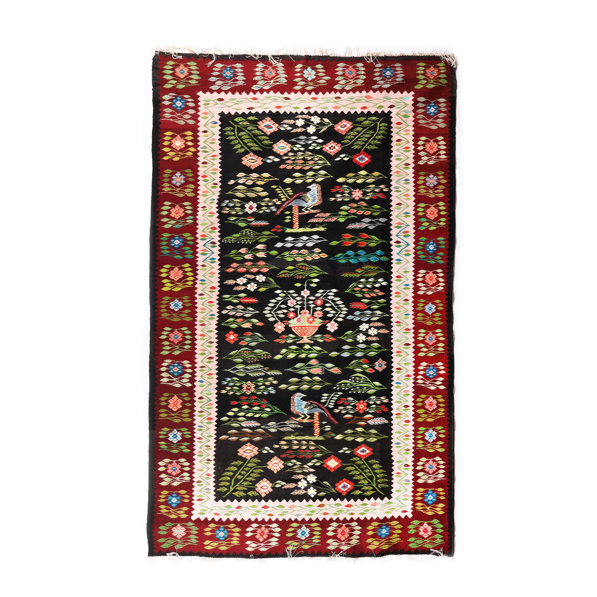 Oltenian wool rug, decorated with peacocks, hollyhocks and other specific floral motifs, first half of the 20th century