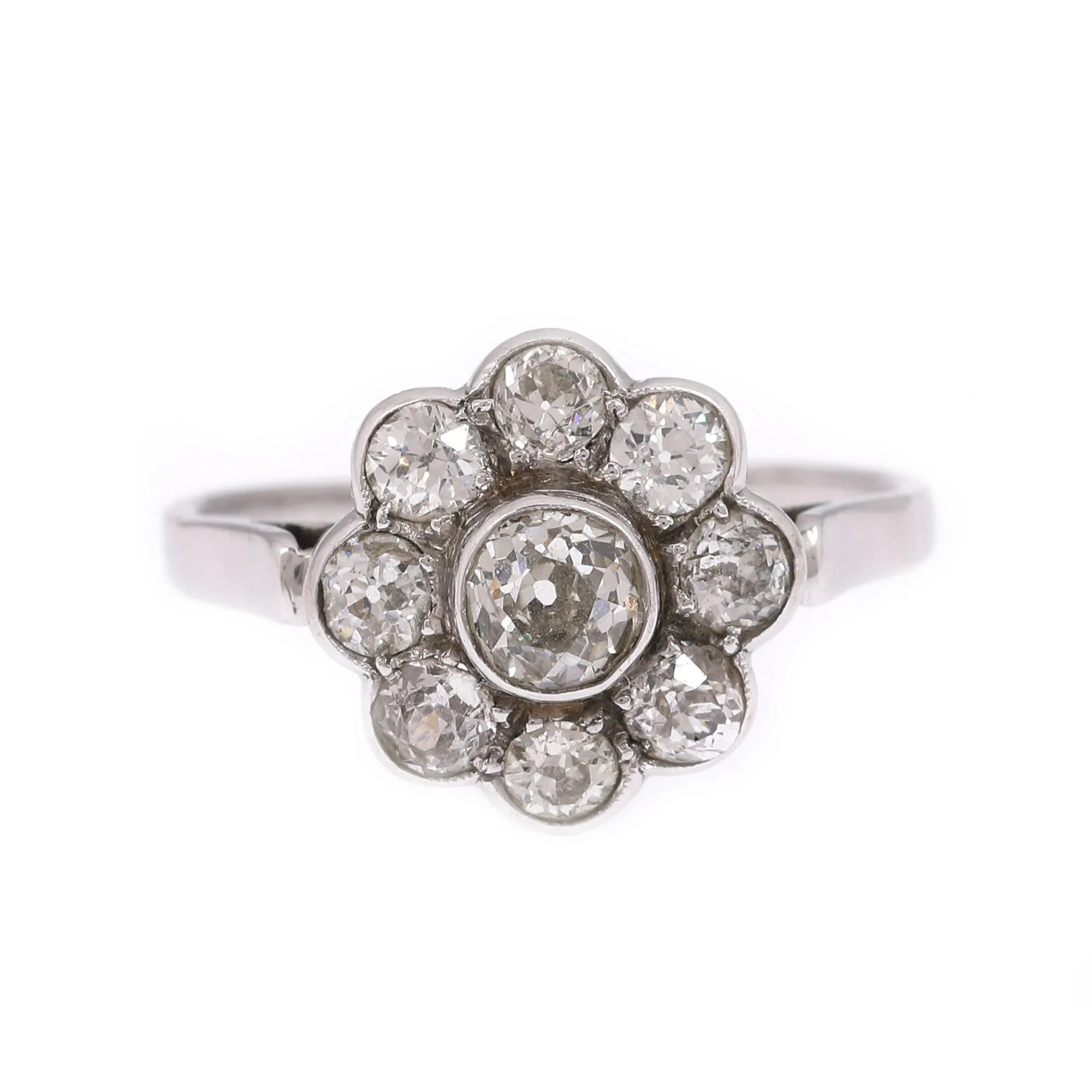 White gold ring, floral pattern, decorated with diamonds