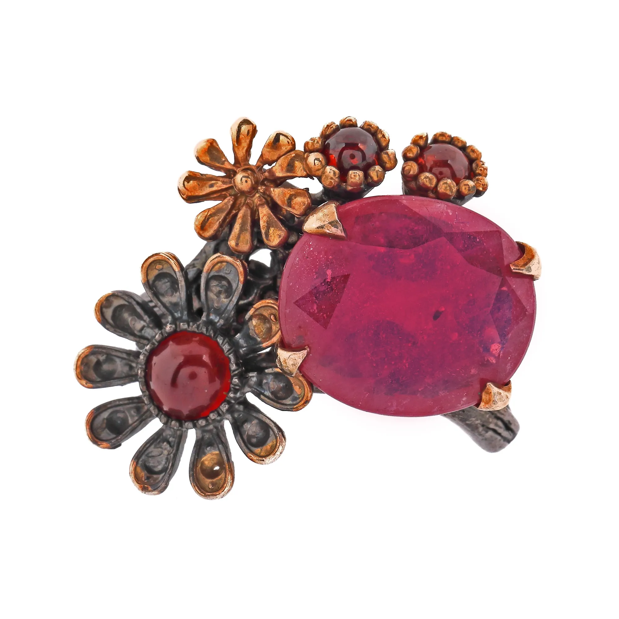 Silver ring decorated with rubies and garnets