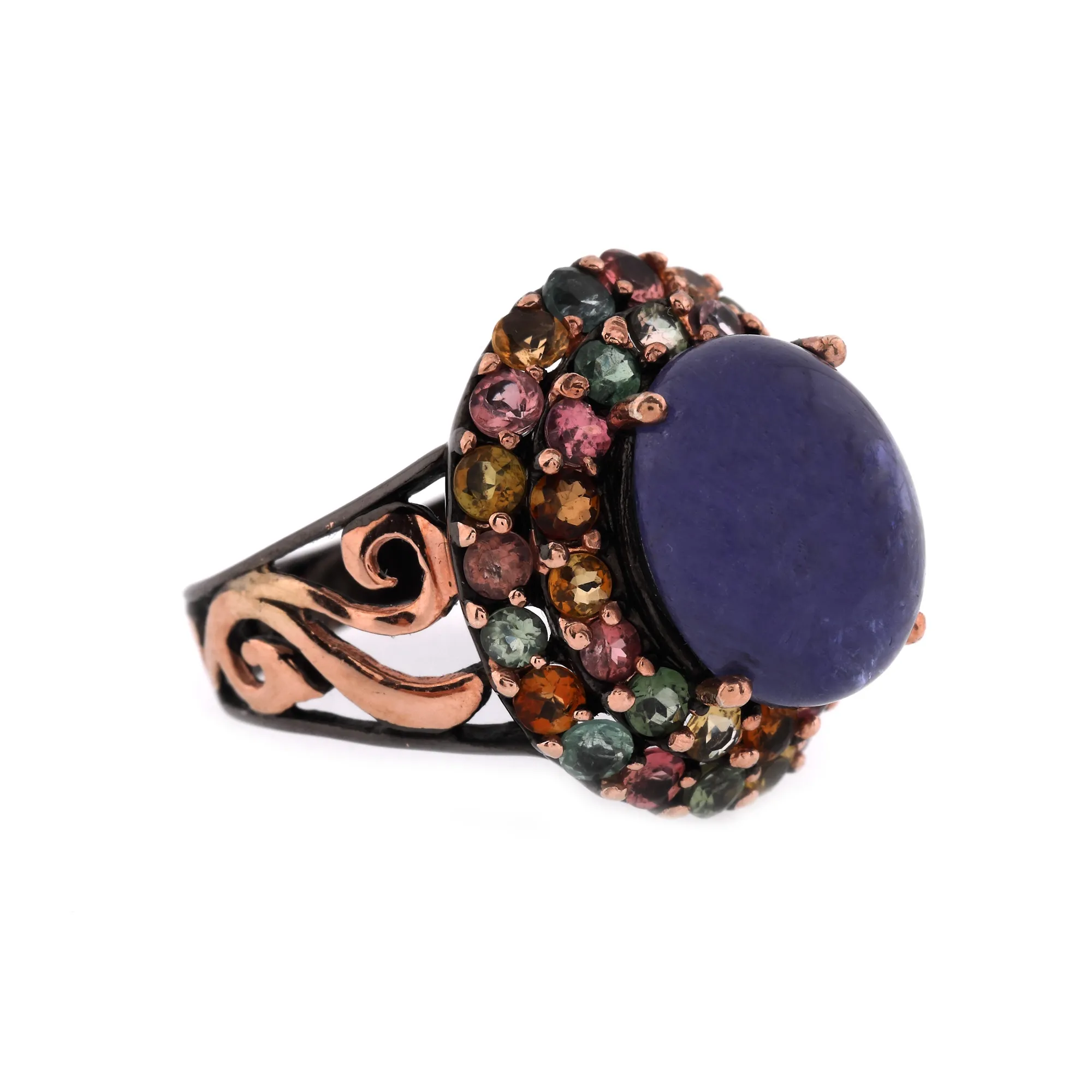 Silver ring decorated with tanzanite and tourmalines