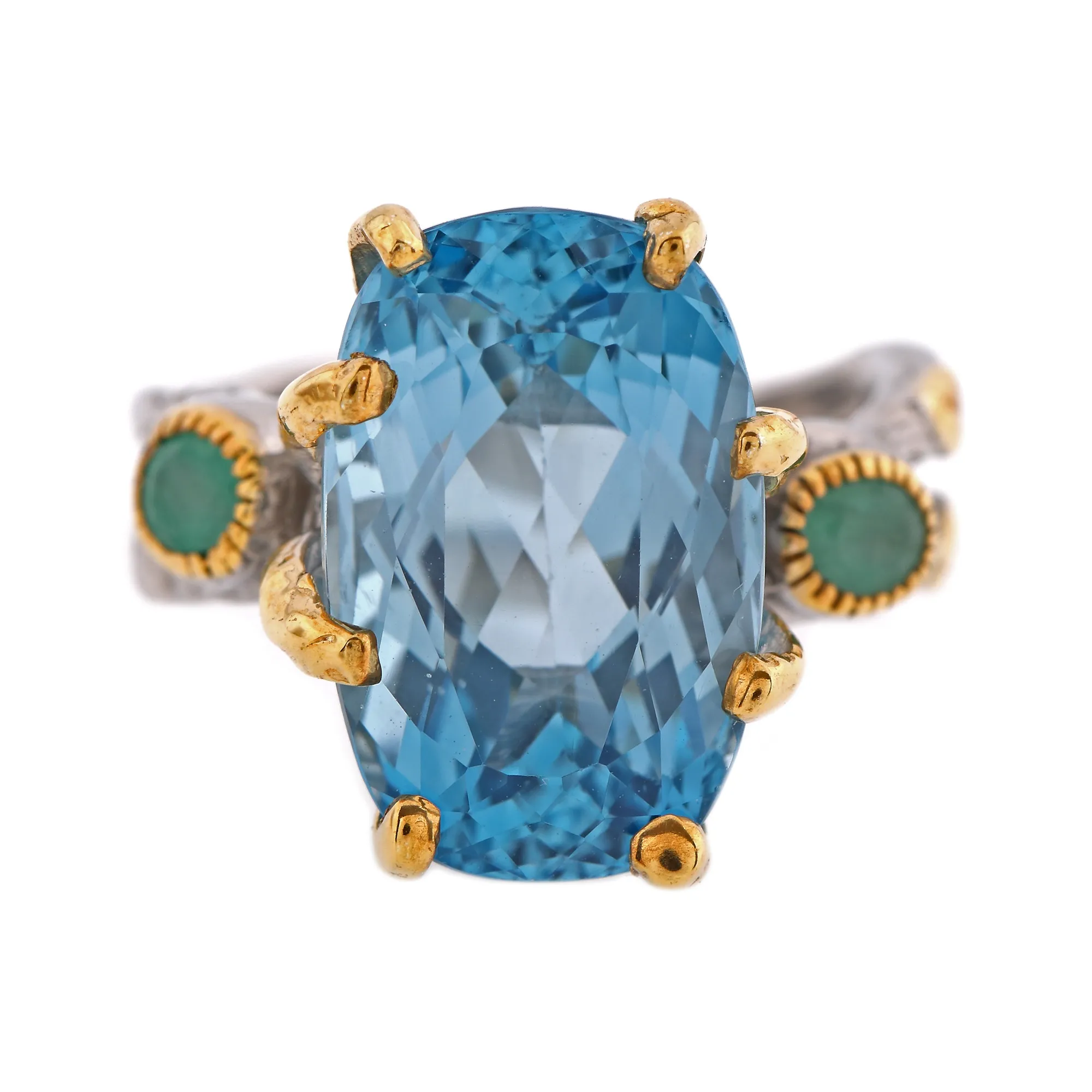 Partially gold-plated silver ring decorated with topaz and emeralds