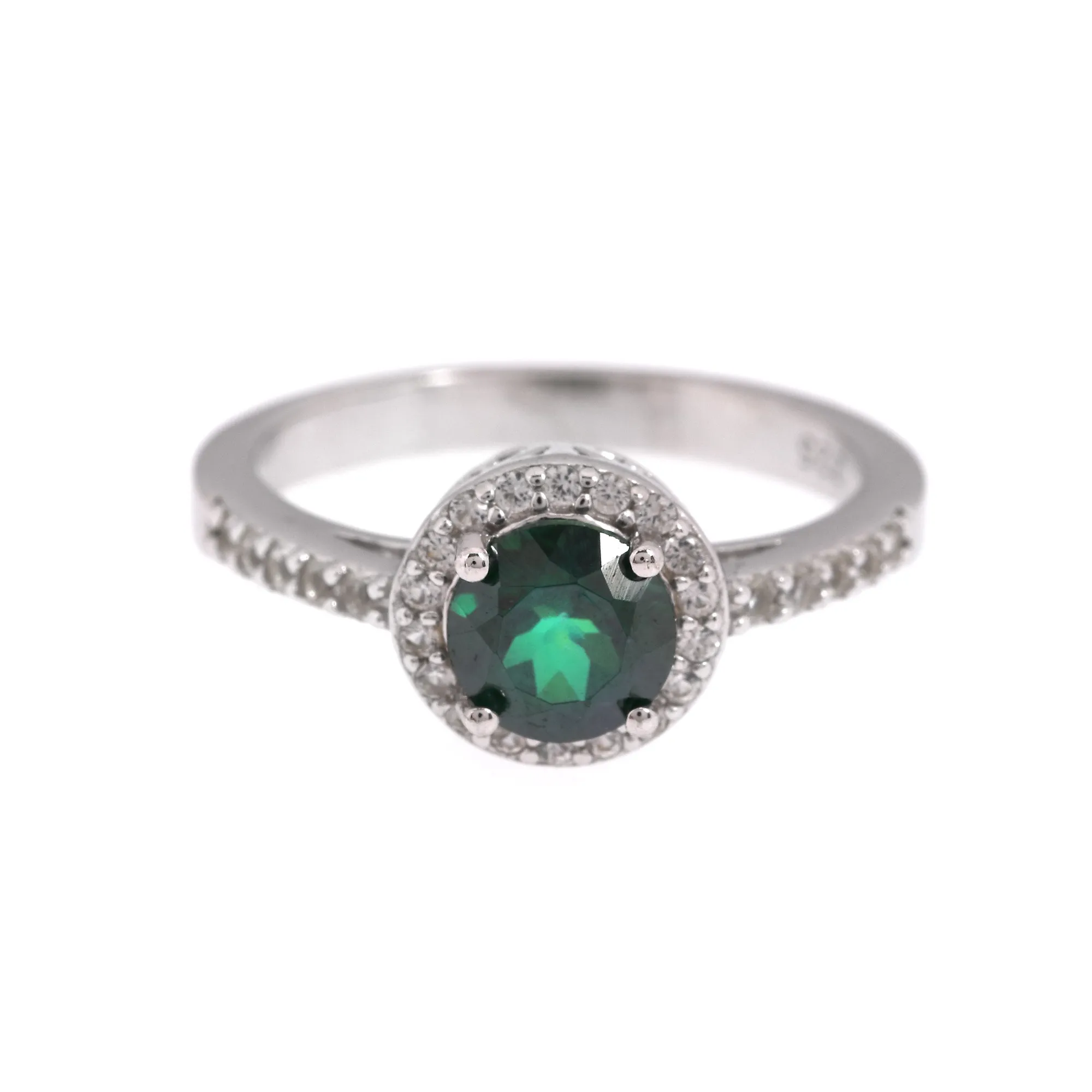 Silver ring plated with white gold, decorated with green topaz and white topazes