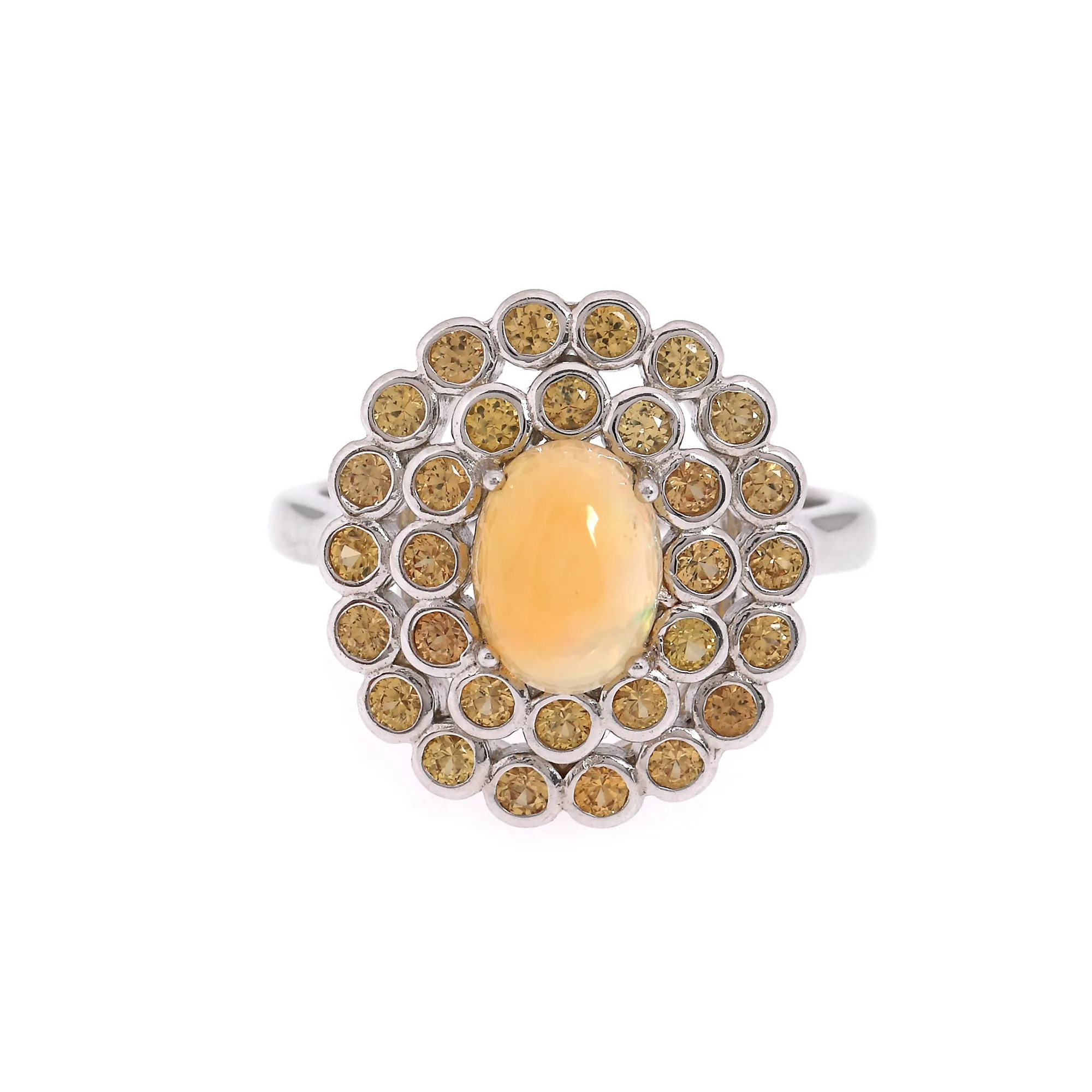 Silver ring plated with white gold, decorated with opal and yellow fire opals