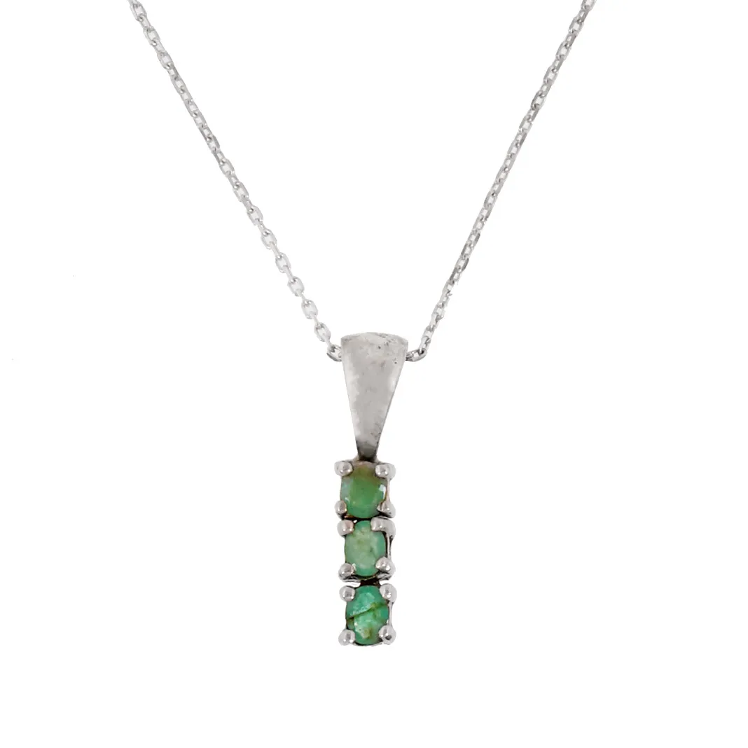 Silver necklace with pendant, decorated with emeralds