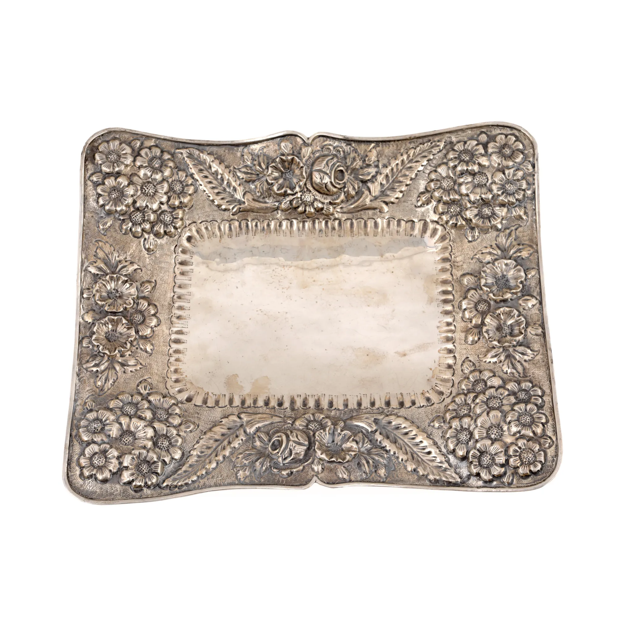 Elaborate silver fruit bowl, richly hand decorated with floral motifs
