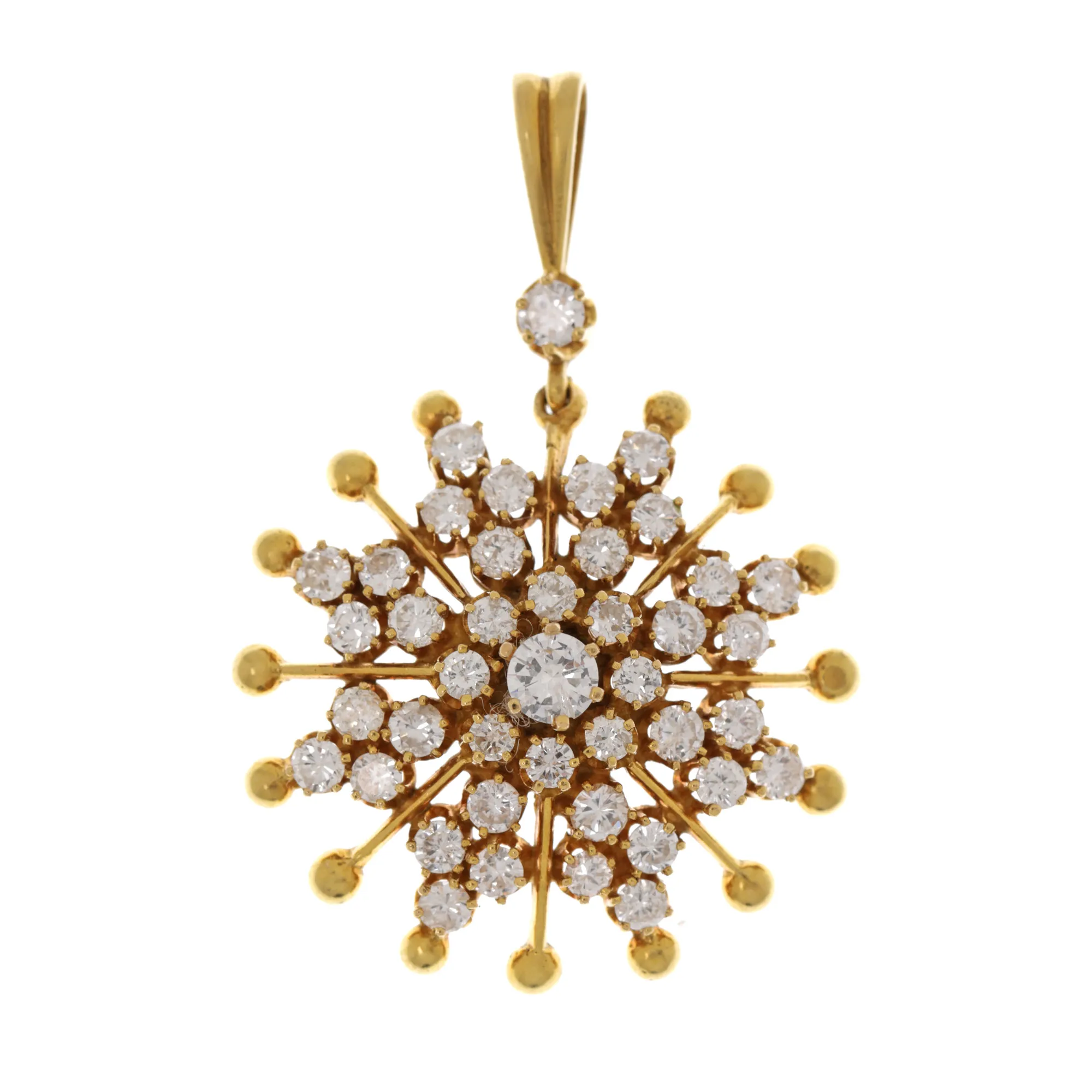 Gold necklace with snowflake shaped pendant, adorned with diamonds