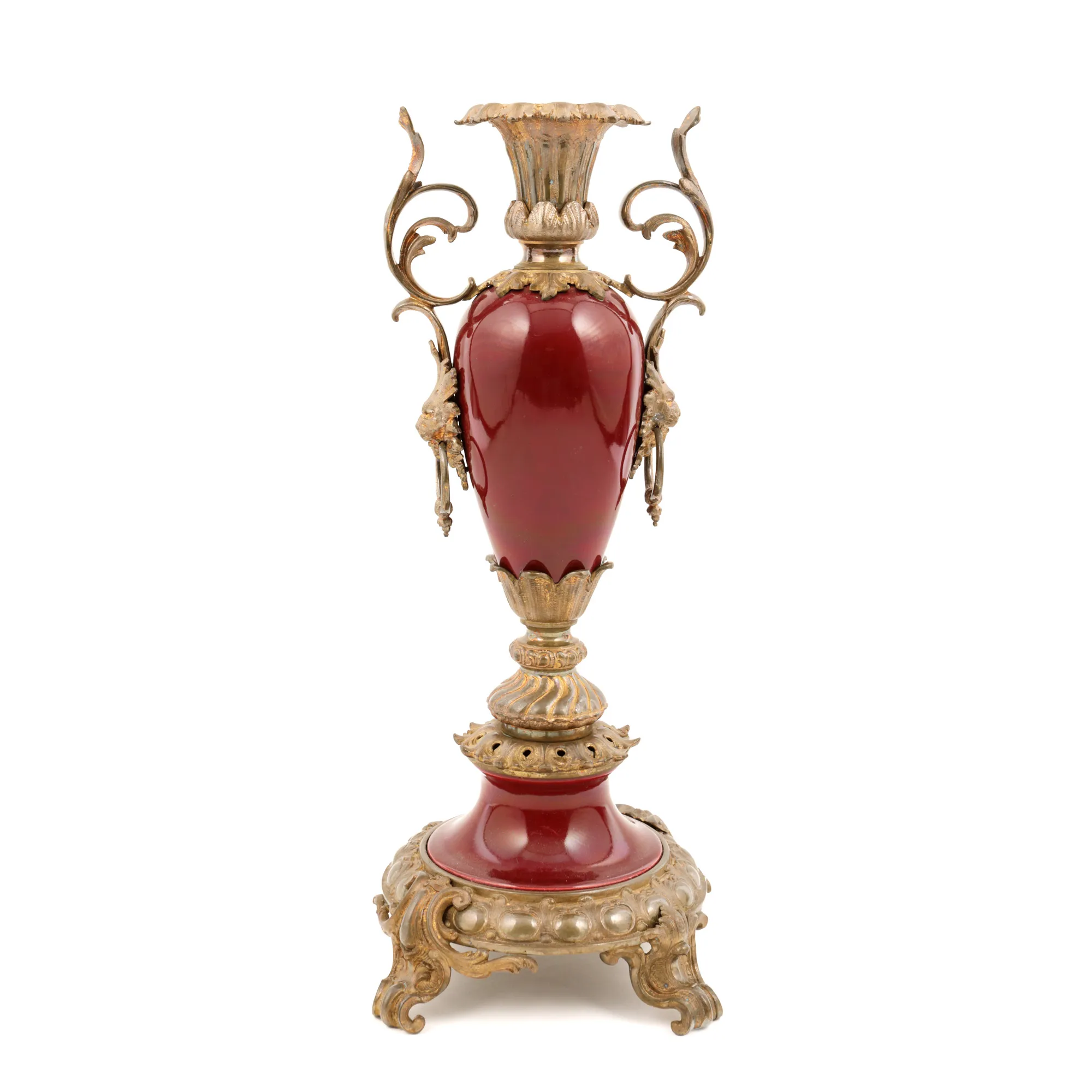 Bronze and enamel candlestick, decorated with lion heads, first half of the 20th century