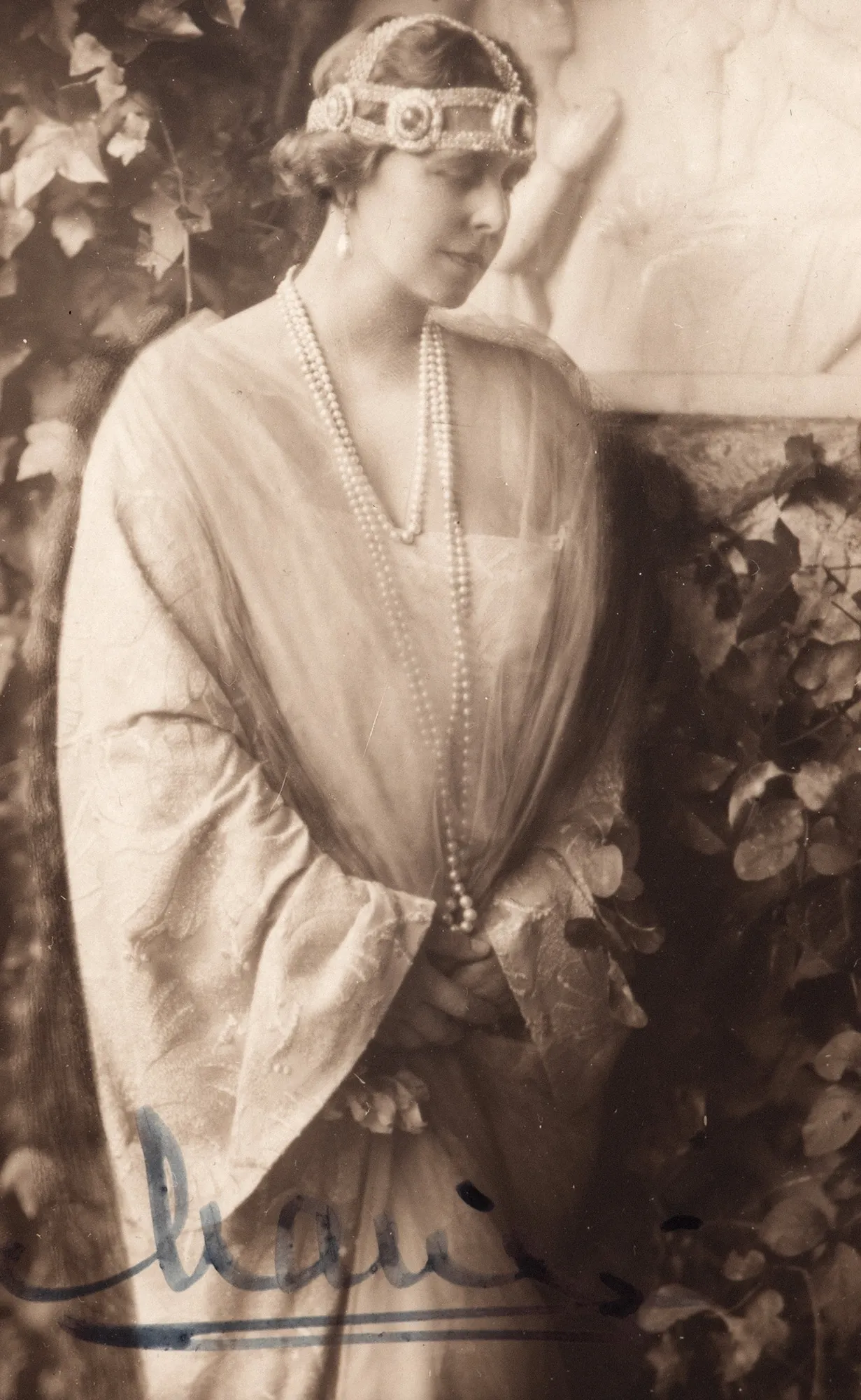 Photograph illustrating Queen Maria, with her holograph signature, circa 1928
