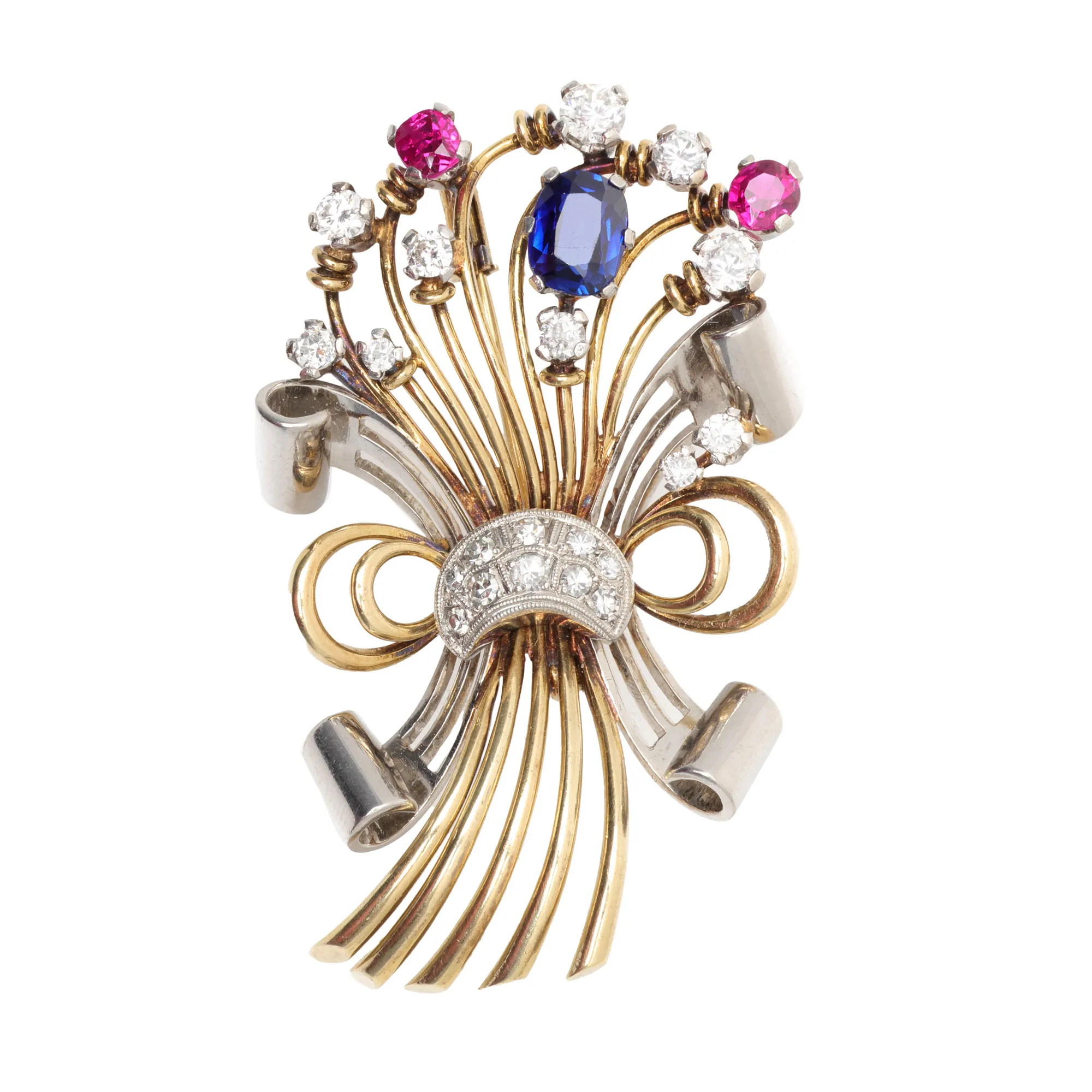 Bicolor gold brooch decorated with sapphire, diamonds, and rubies