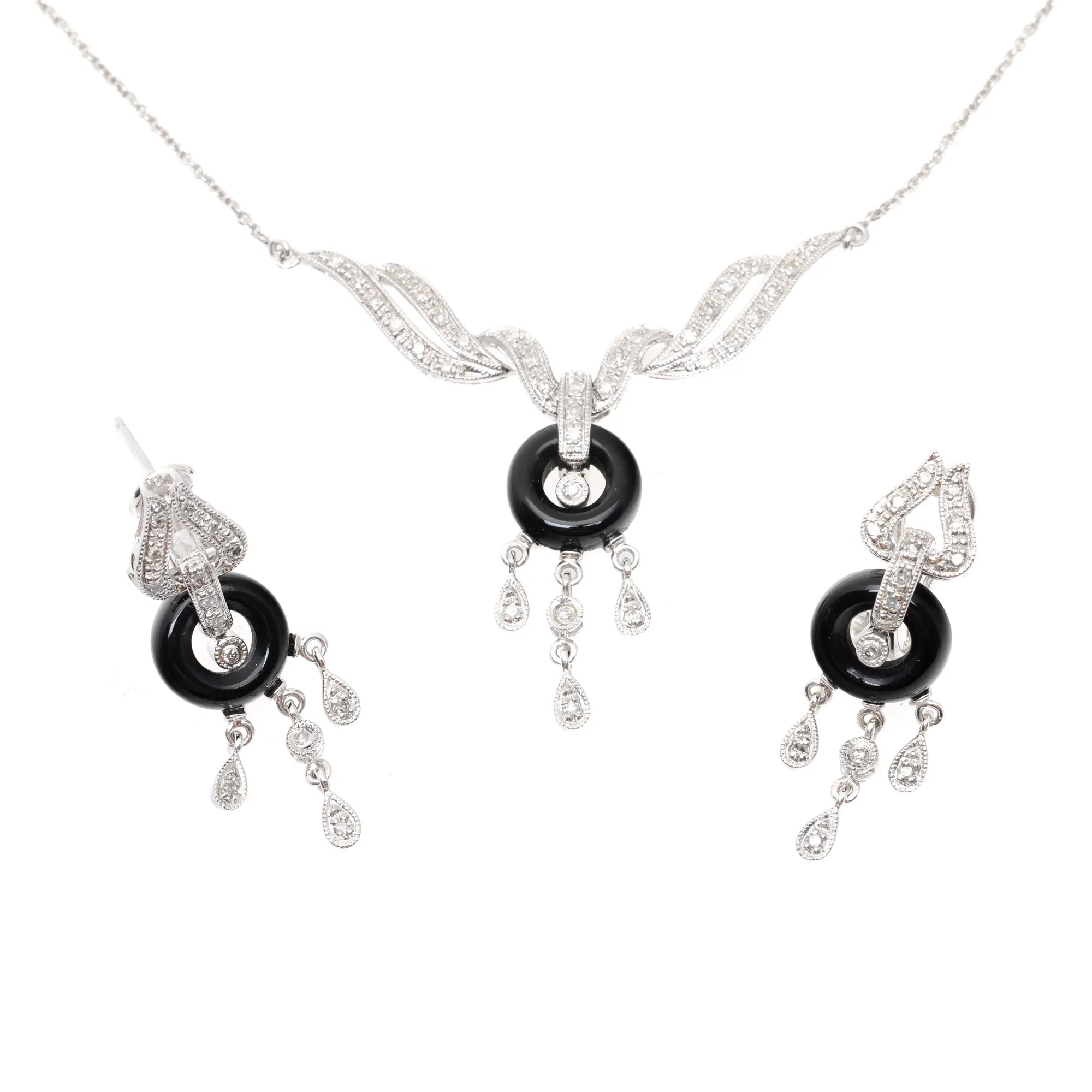 Set in Art Deco style, consisting of pendant chain and pair of earrings, in white gold, decorated with diamonds