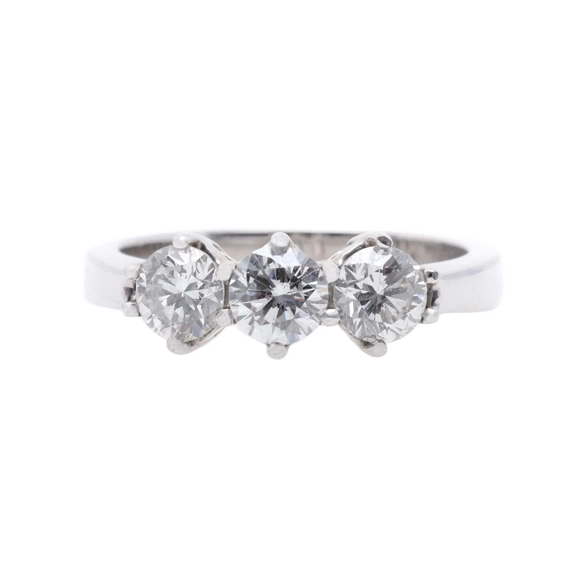 White gold ring, decorated with a triad of diamonds