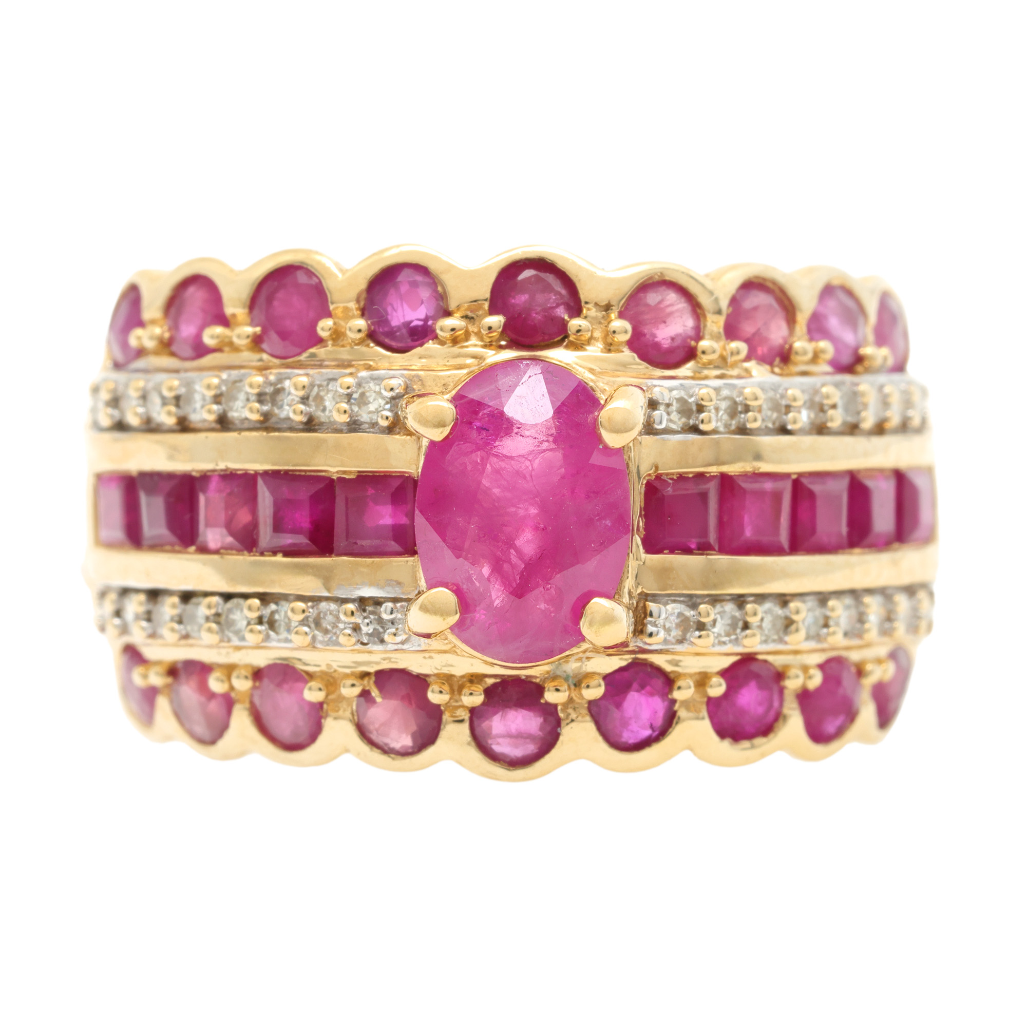 Gold ring decorated with rubies and diamonds
