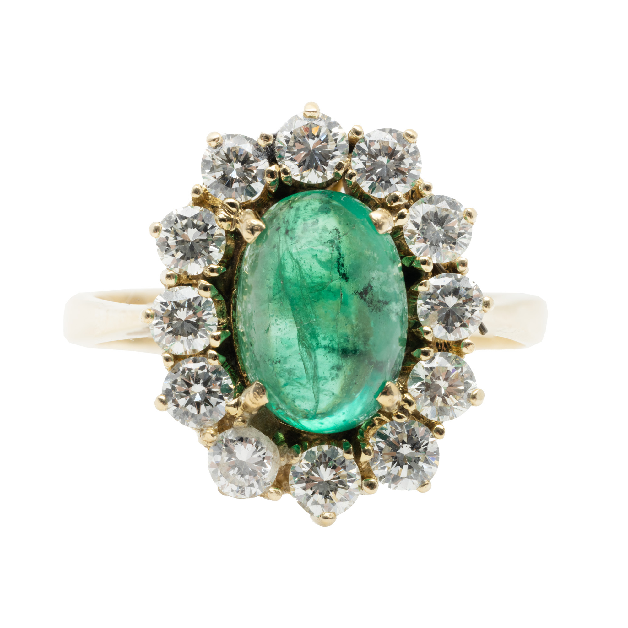 Gold ring, decorated with diamonds and emerald