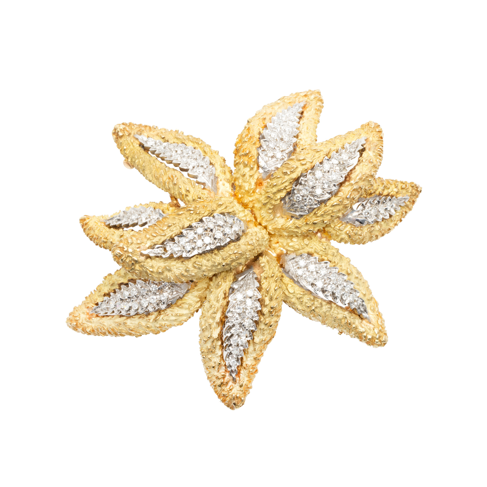 Spectacular two-tone gold brooch, in the shape of a flower, paved with diamonds