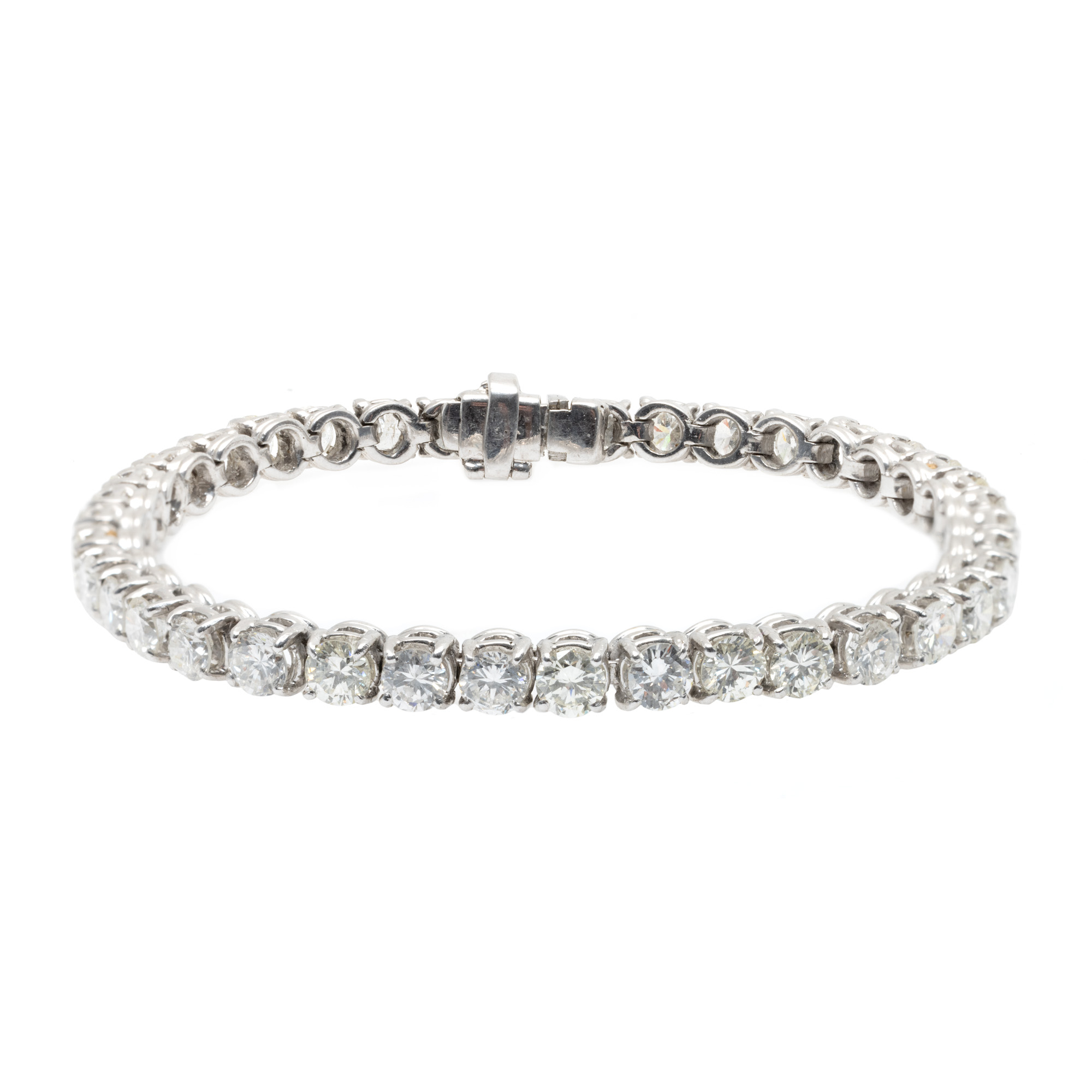 White gold tennis bracelet, decorated with approximately 9.30 ct. diamonds.