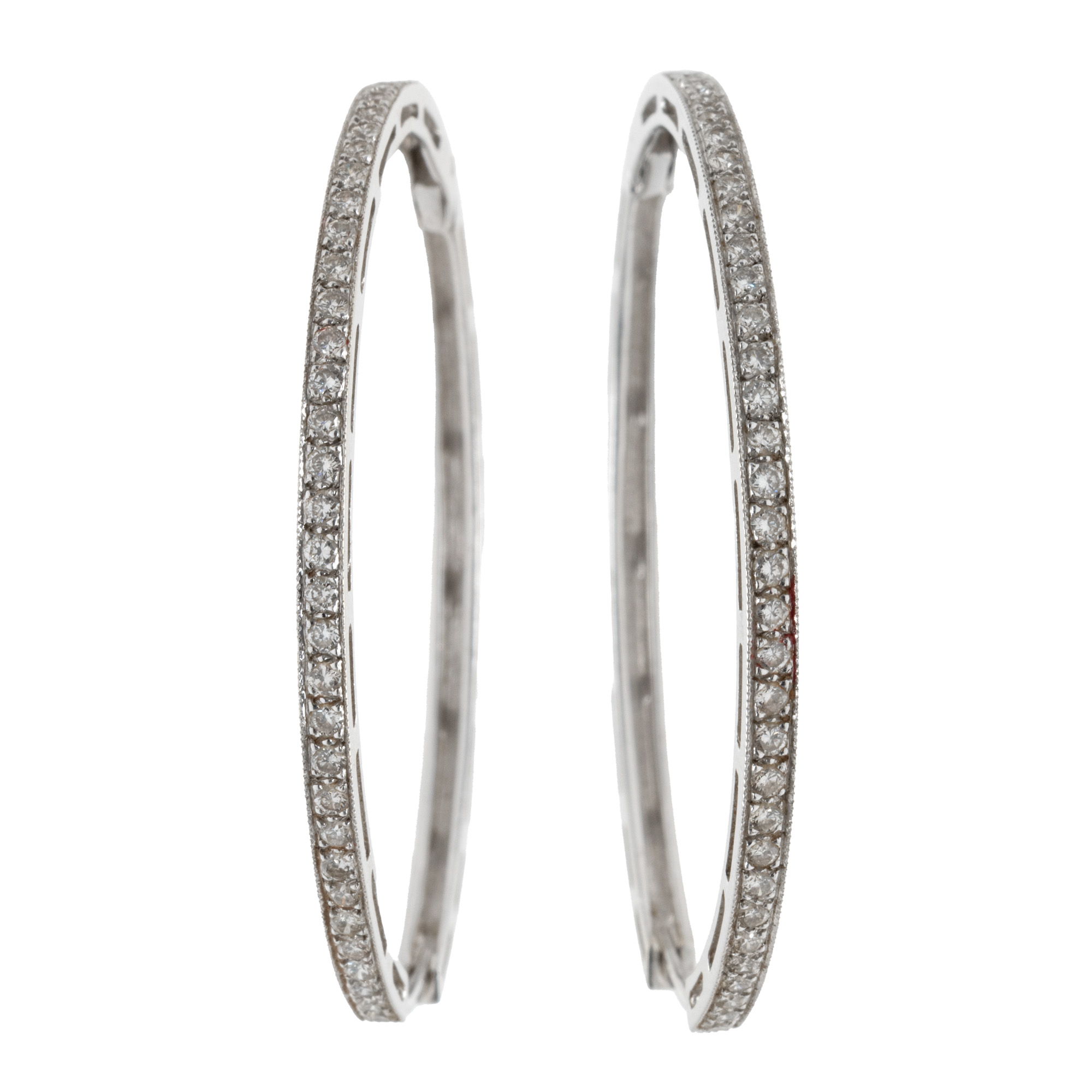 Pair of white gold earrings, decorated with diamonds
