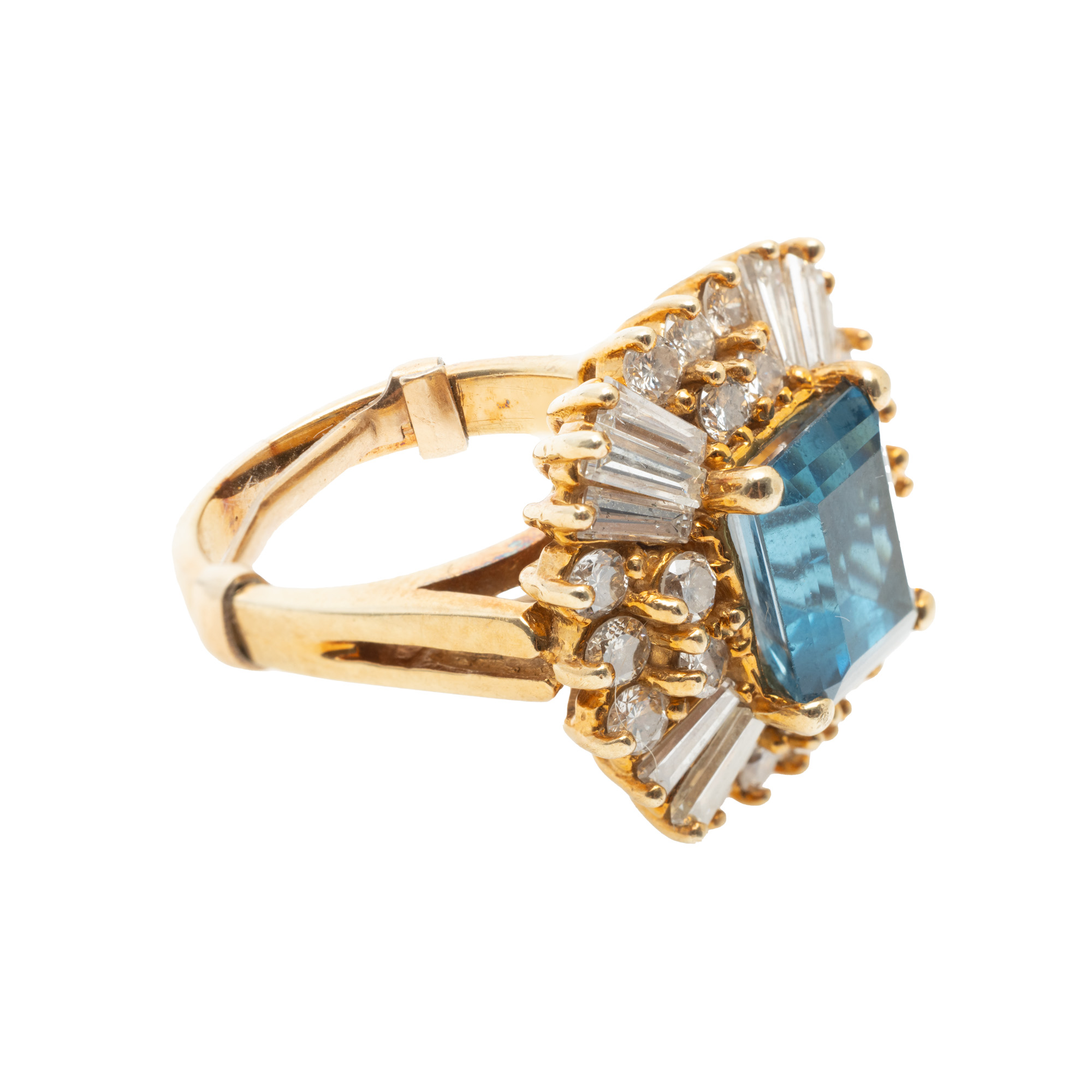 Gold ring, decorated with diamonds and central topaz
