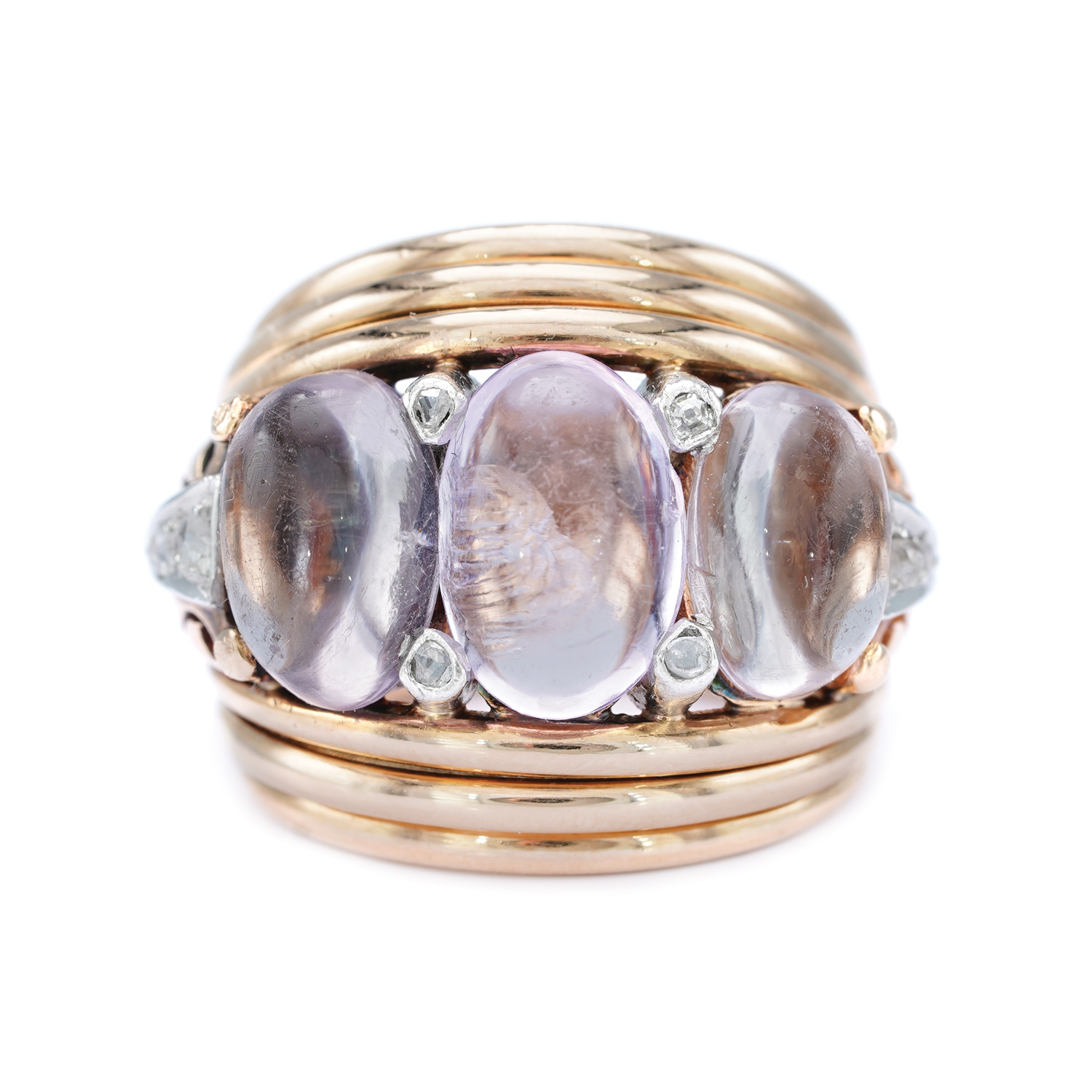 Platinum cocktail ring adorned with amethysts and diamonds